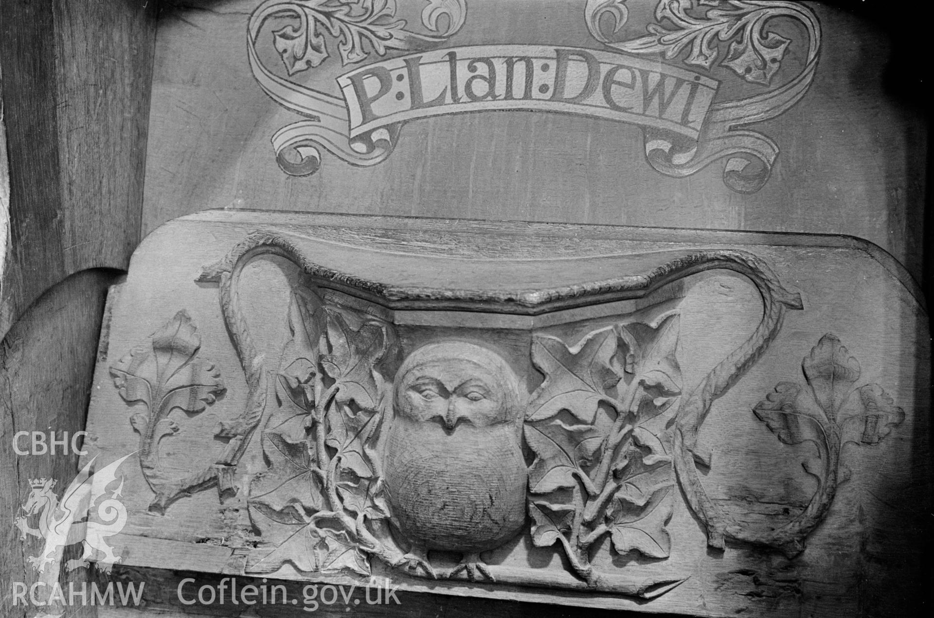 Black and white nitrate negative showing misericord at St Davids Cathedral.