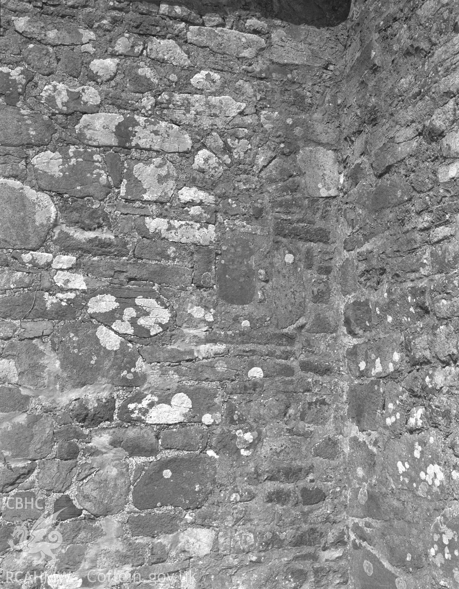 Black and white nitrate negative showing exterior stonework at Llaniestyn Church.