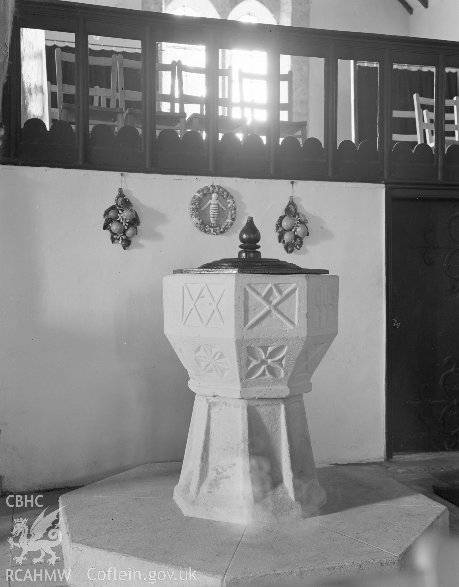 Black and white nitrate negative showing font at Llaniestyn Church.