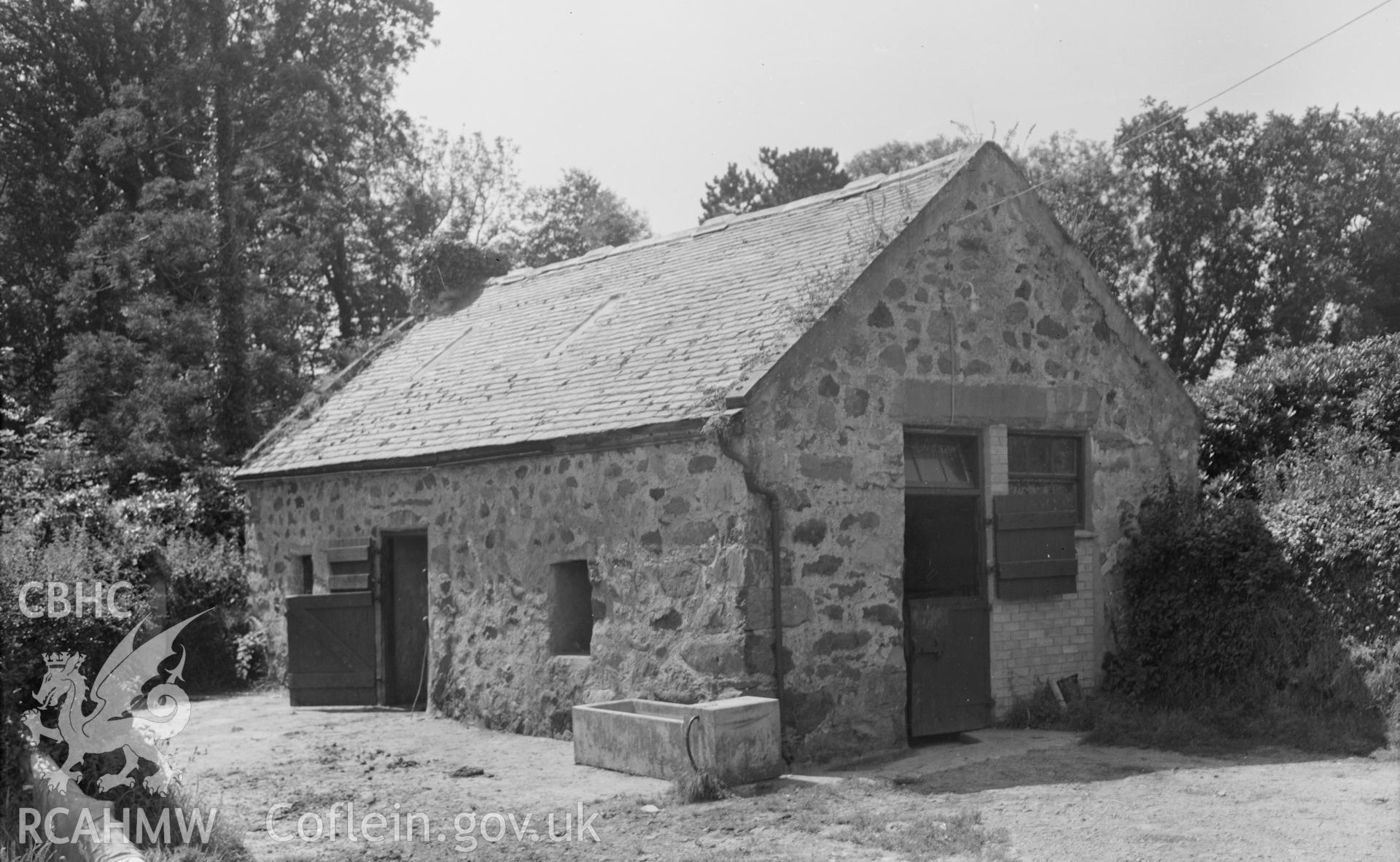 Black and white nitrate negative showing exterior view of Rhyllech.
