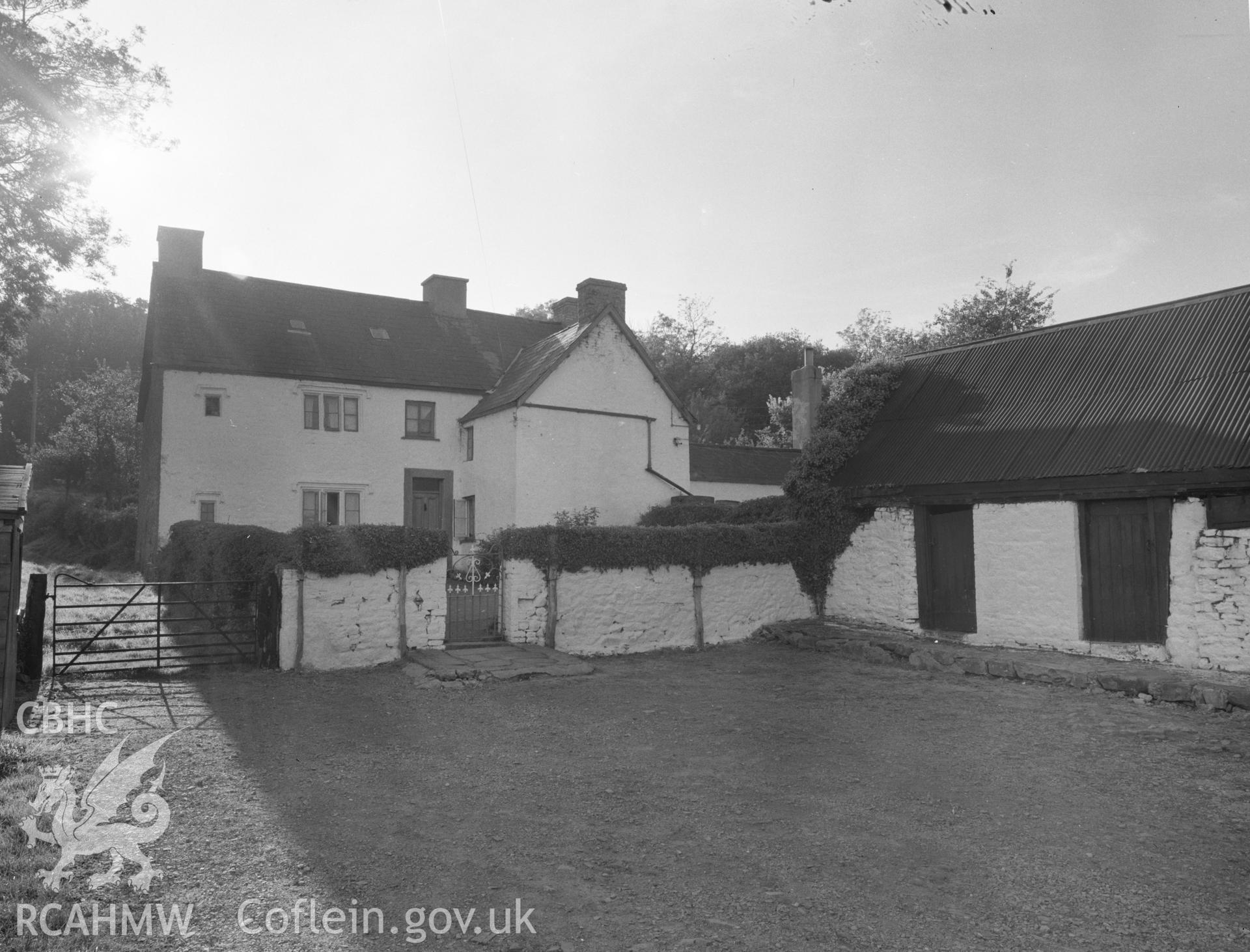 Black and white acetate negative showing exterior view of Cae'r Wigau Isaf.