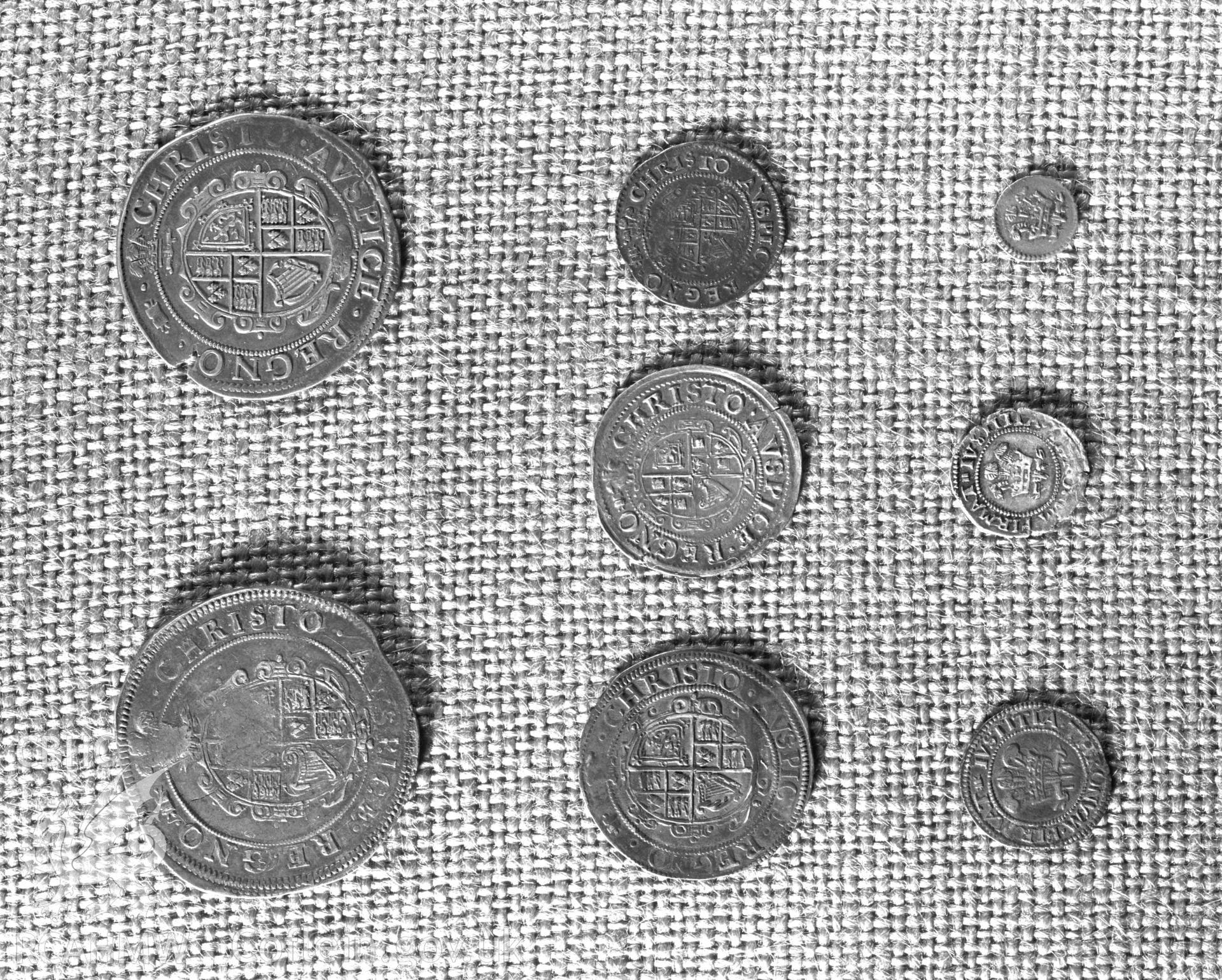 Black and white acetate negative showing coins from Aberystwyth Mint.