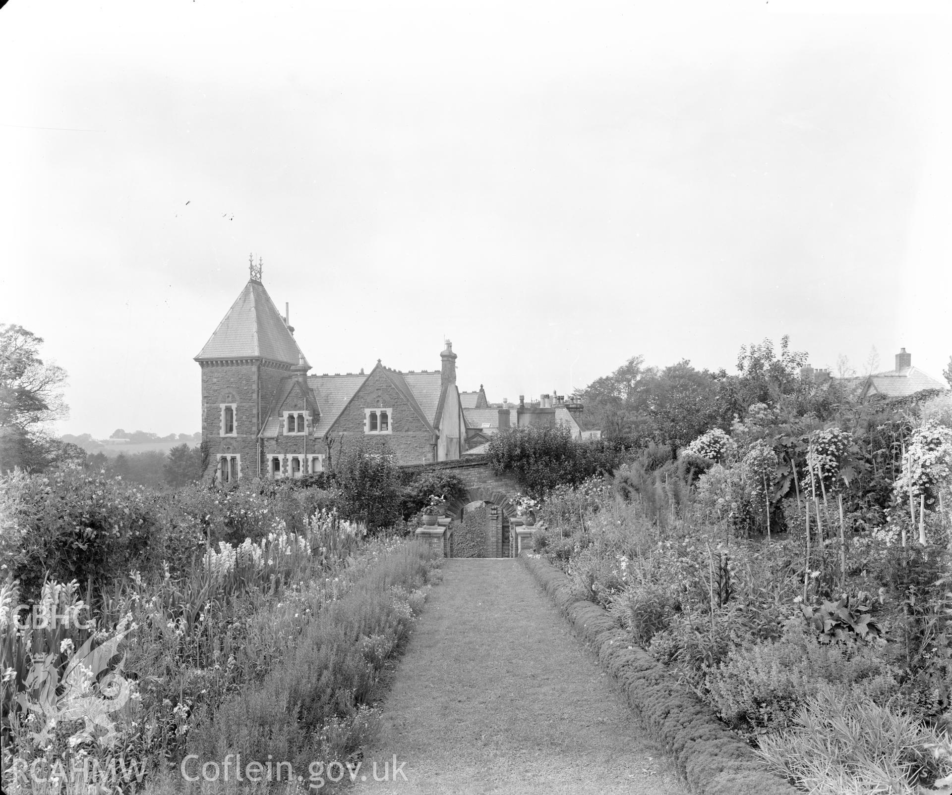 Outsize glass plate negative showing Coomb House.