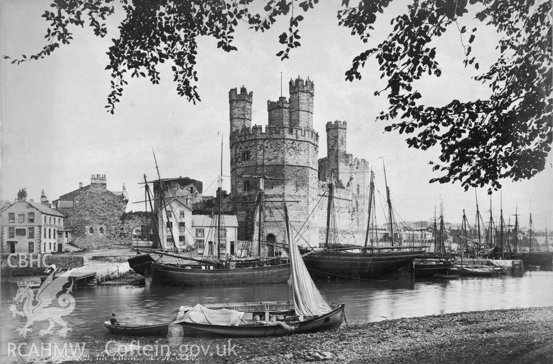 Caernarfon Castle; undated black and white photograph showing the castle also showing in the eastern side of the entrance to the Seiont and coastal traders.