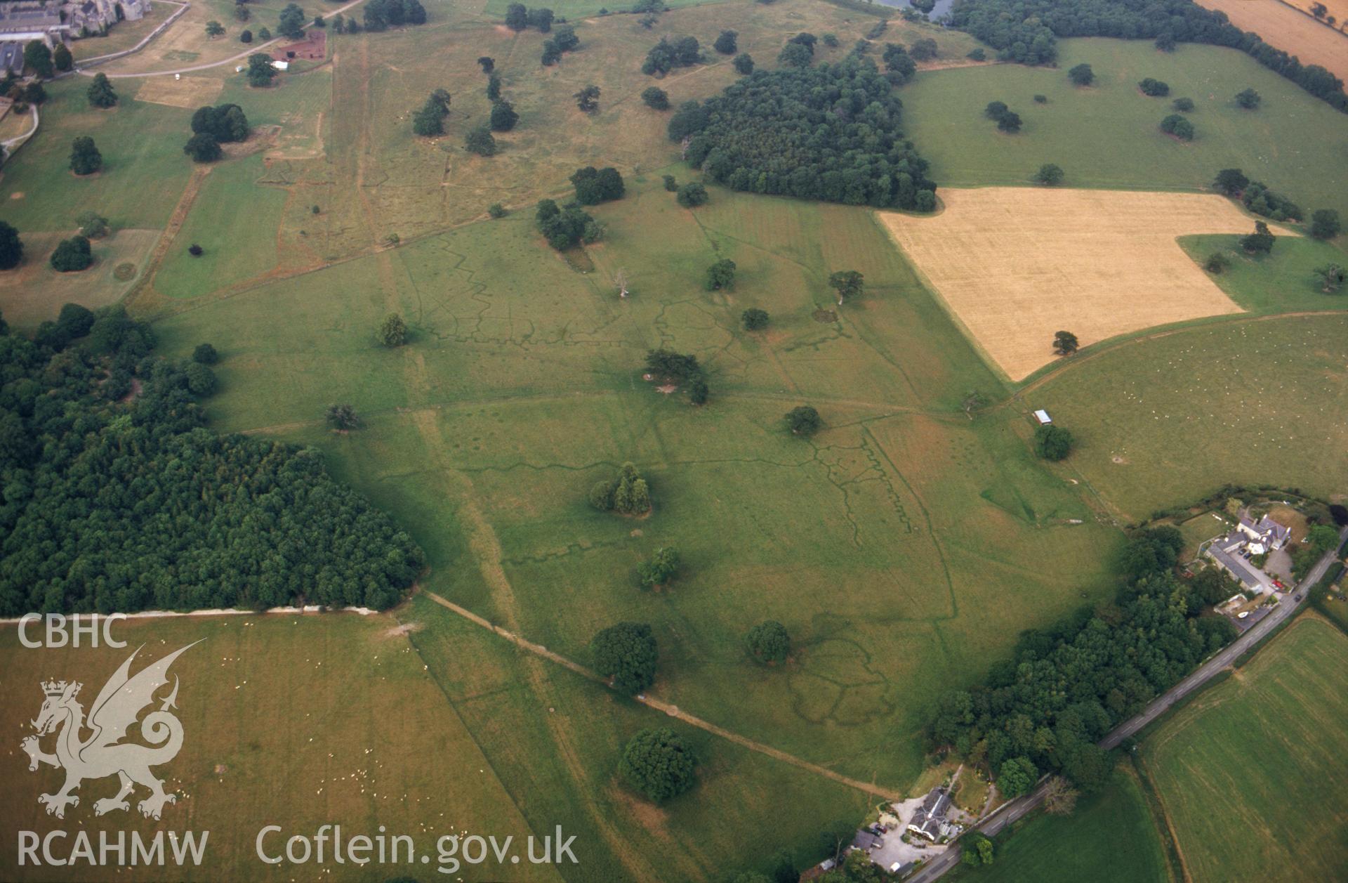 RCAHMW colour slide oblique aerial photograph of army practice trenches at Bodelwyddan Park, Bodelwyddan, taken by C.R.Musson on the 22/07/1996