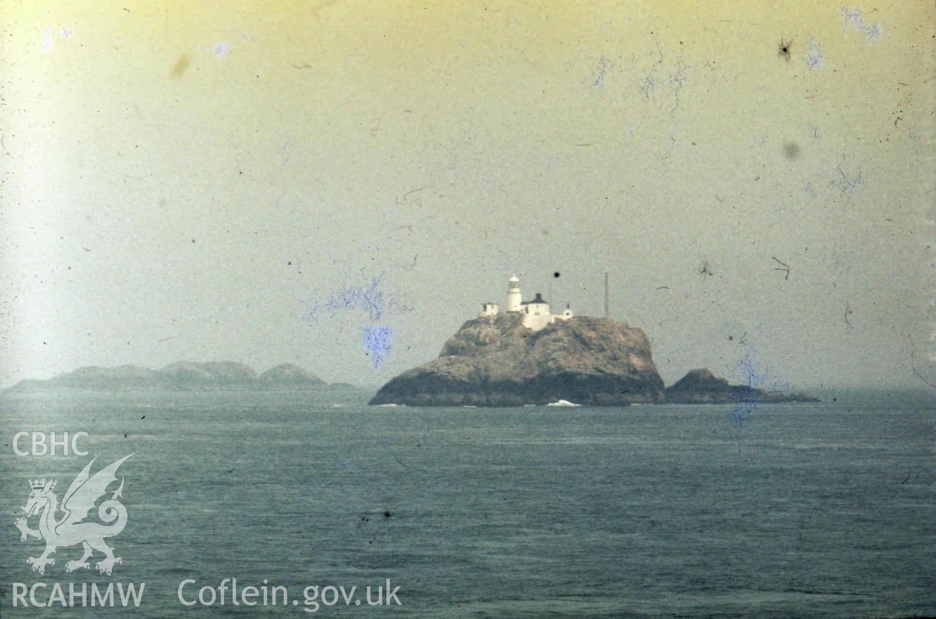 Colour slide showing South Bishop Lighthouse from the sea.
