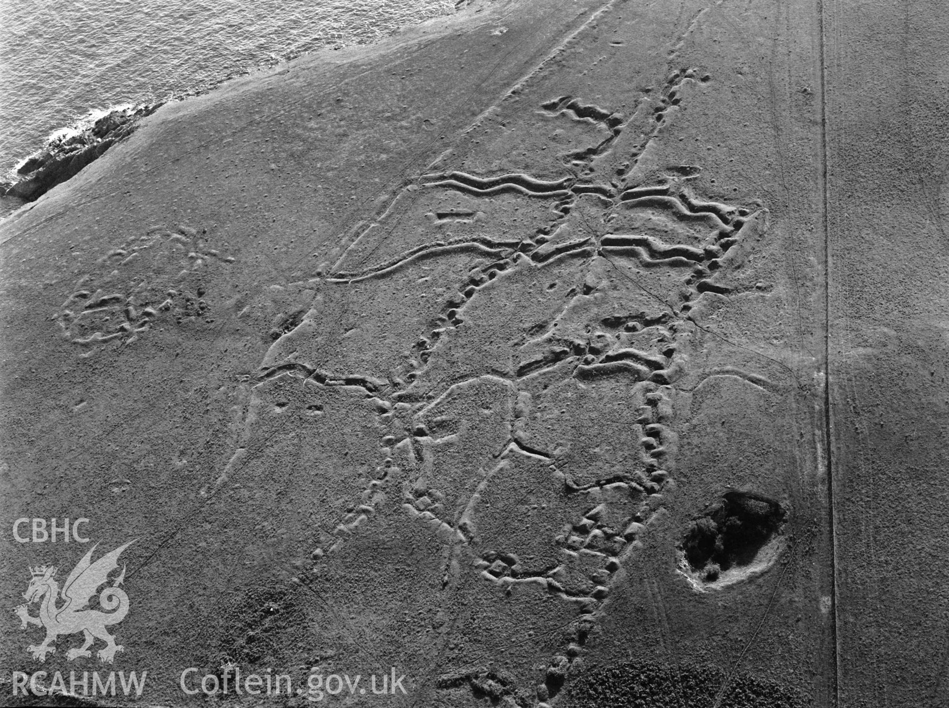RCAHMW black and white oblique aerial photograph of Penally WW1 Practice Trench system. Taken by Toby Driver on 02/09/2002