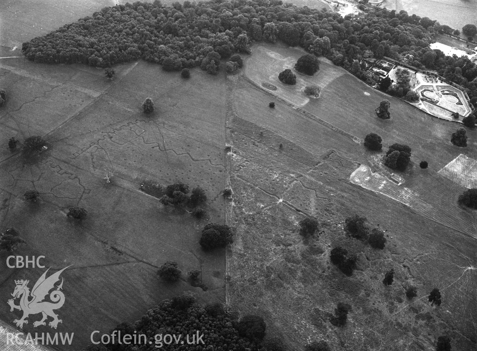 RCAHMW black and white oblique aerial photograph of Bodelwyddan Park Army Practice Trenches, taken by C R Musson, 22/07/1996.