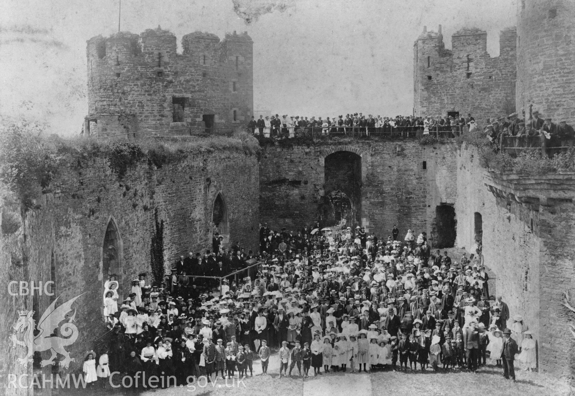 D.O.E photograph of Conwy Castle, showing crowds inside castle.