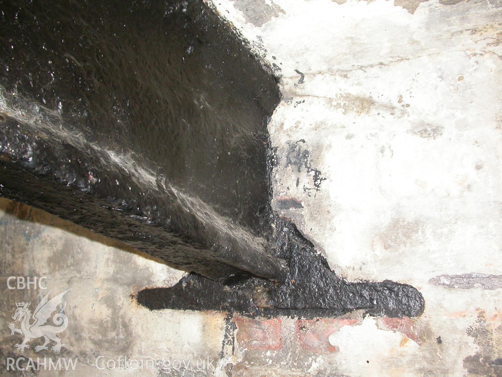 Detail of iron rib fitting into iron-shoe encased in the masonry north-west abutment.