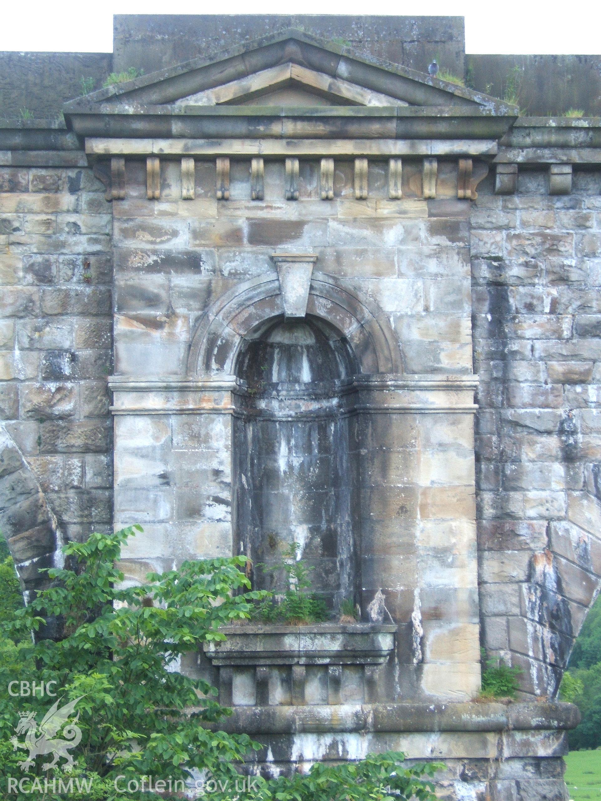 Close-up of niche showing corbelled cornices.
