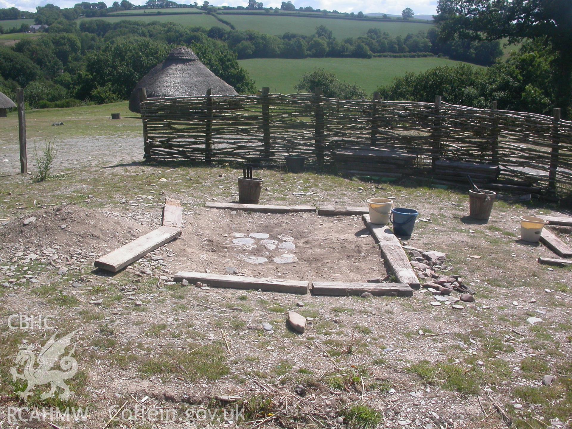 Open cooking area in centre of hillfort on roundhouse site, looking south-west.