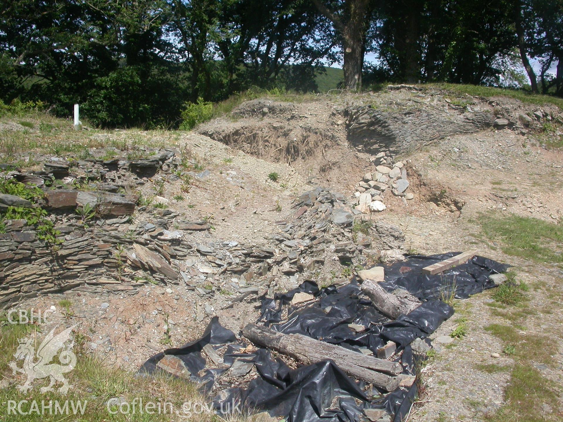 Excavation of collapsed inner retaining wall of north-east inner bank of the hillfort.