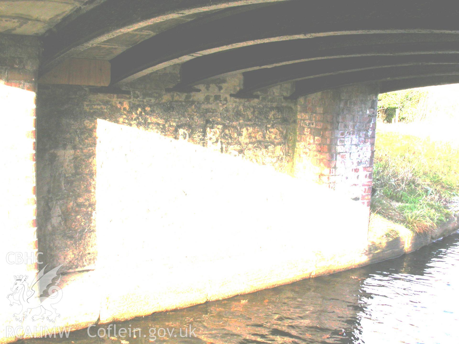 North-west abutment showing six of the seven iron ribs supporting the segmental stone arch.