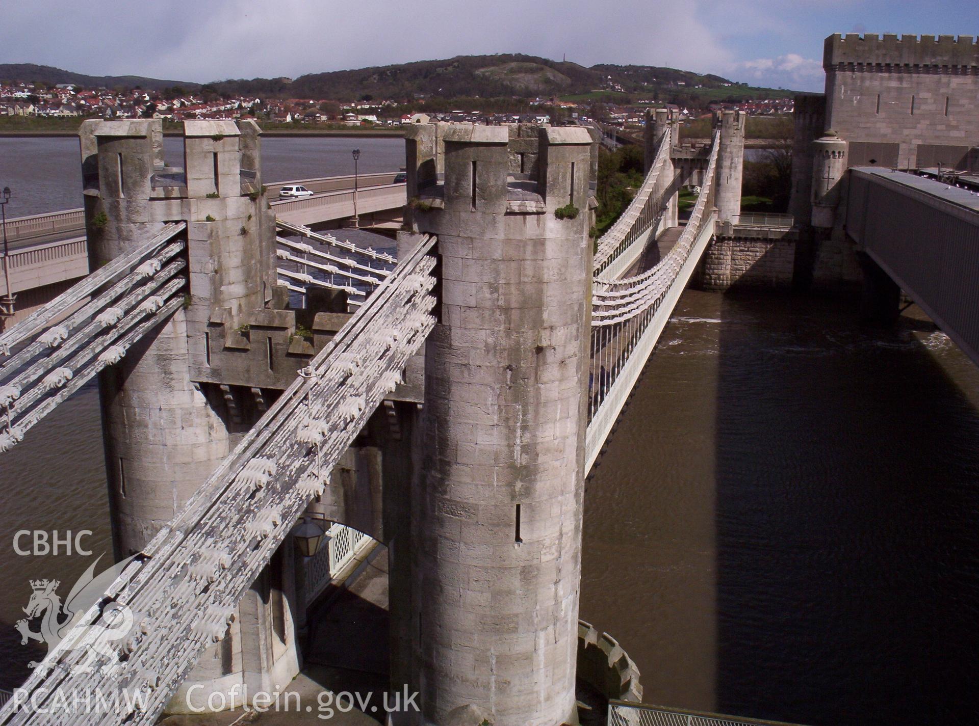 South-eastern side of the suspension bridge from Conwy Castle with railway bridge to the right.