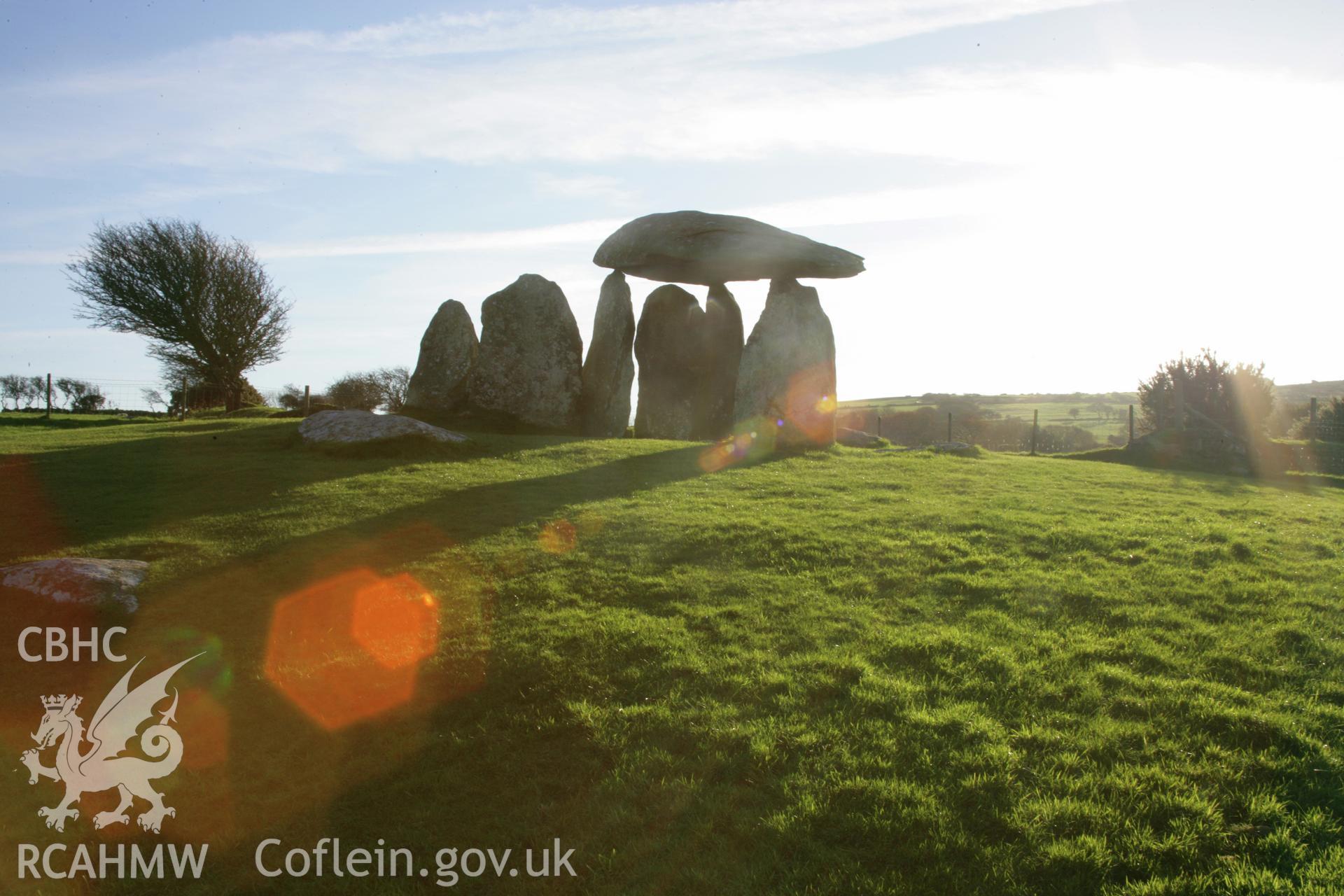 Pentre Ifan chambered tomb at sunset; general view of chamber and mound from the north.