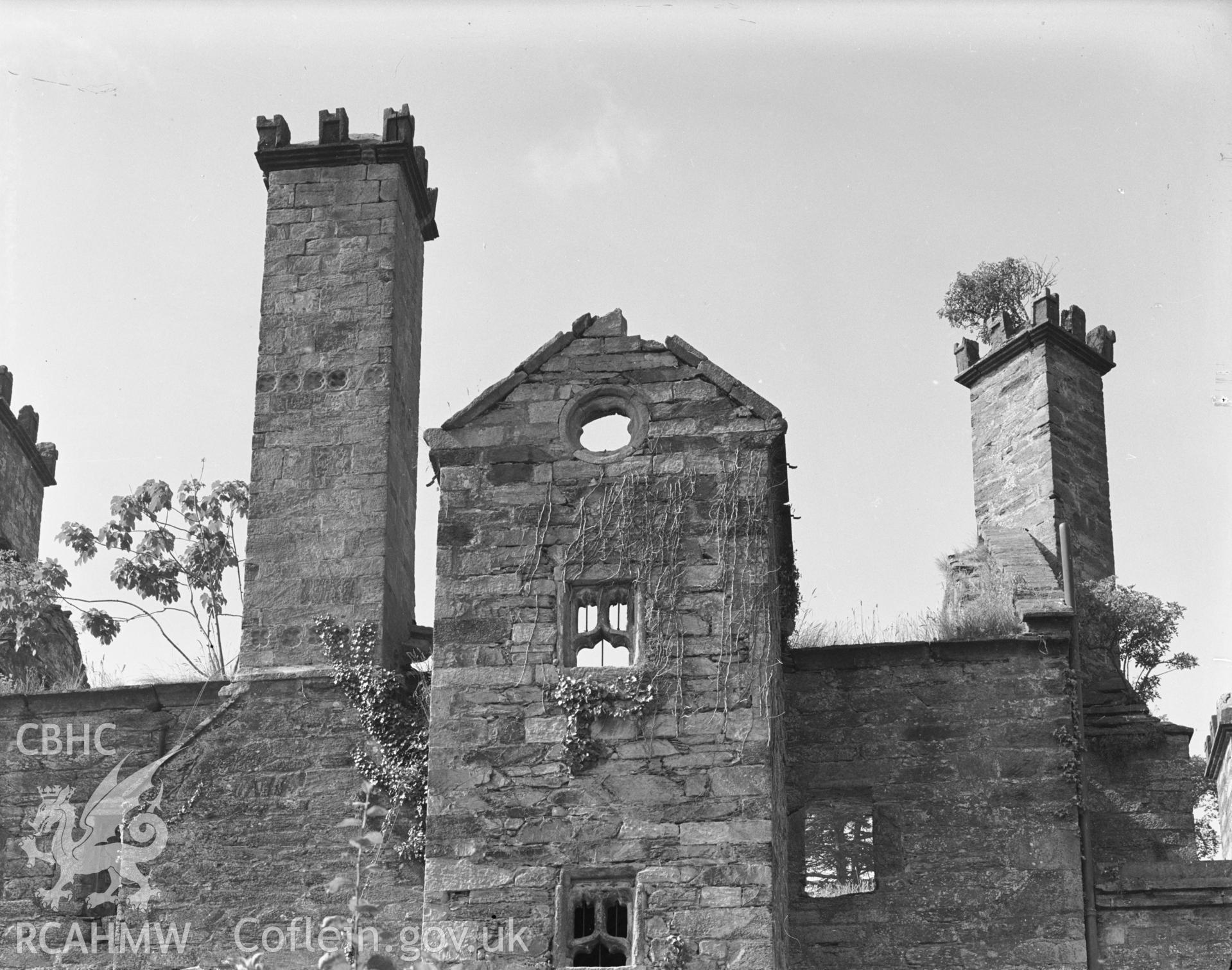 View of the north elevation showing the quatrefoil courses on the chimneys.