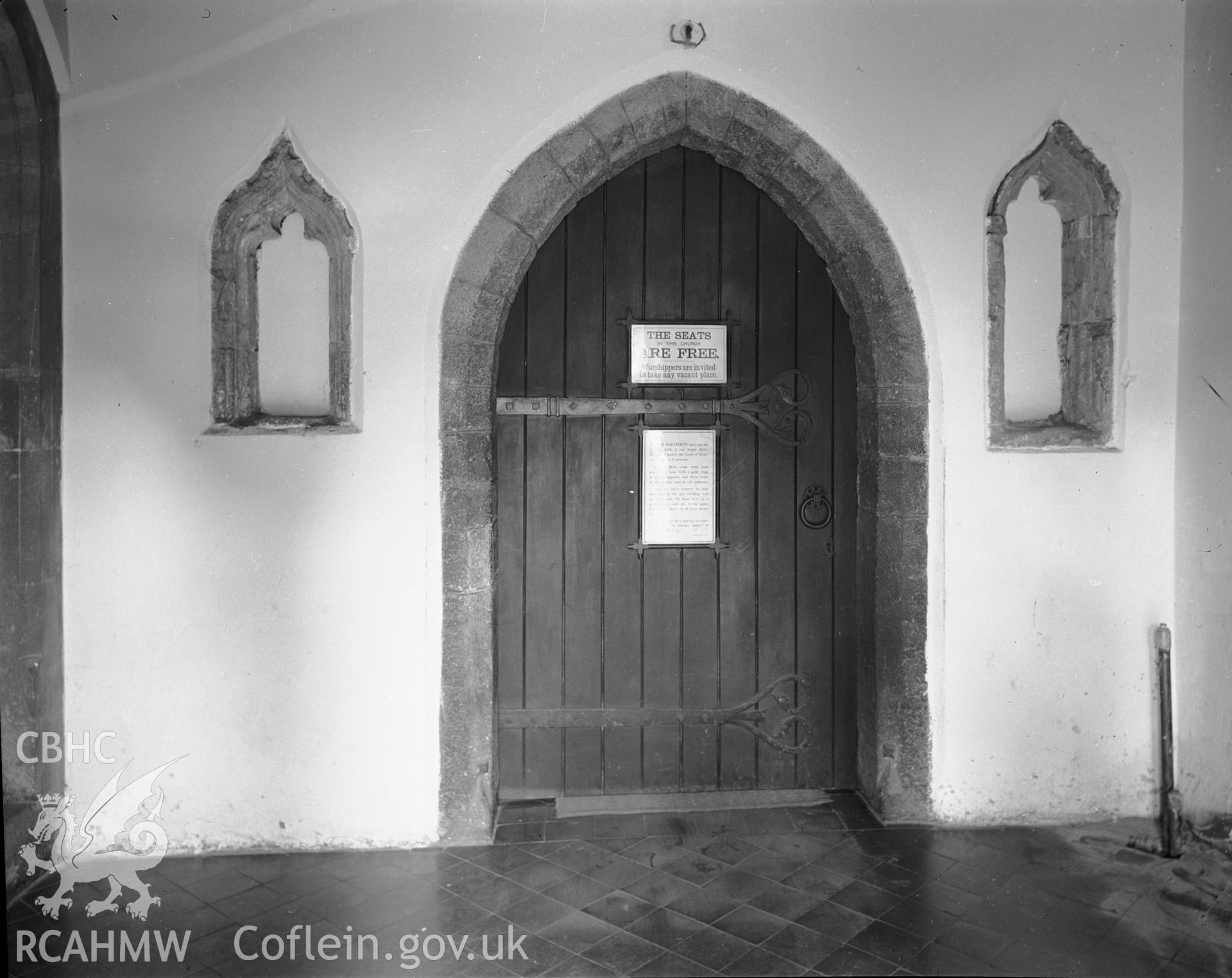 B&W photocopy of photo showing South doorway and niches