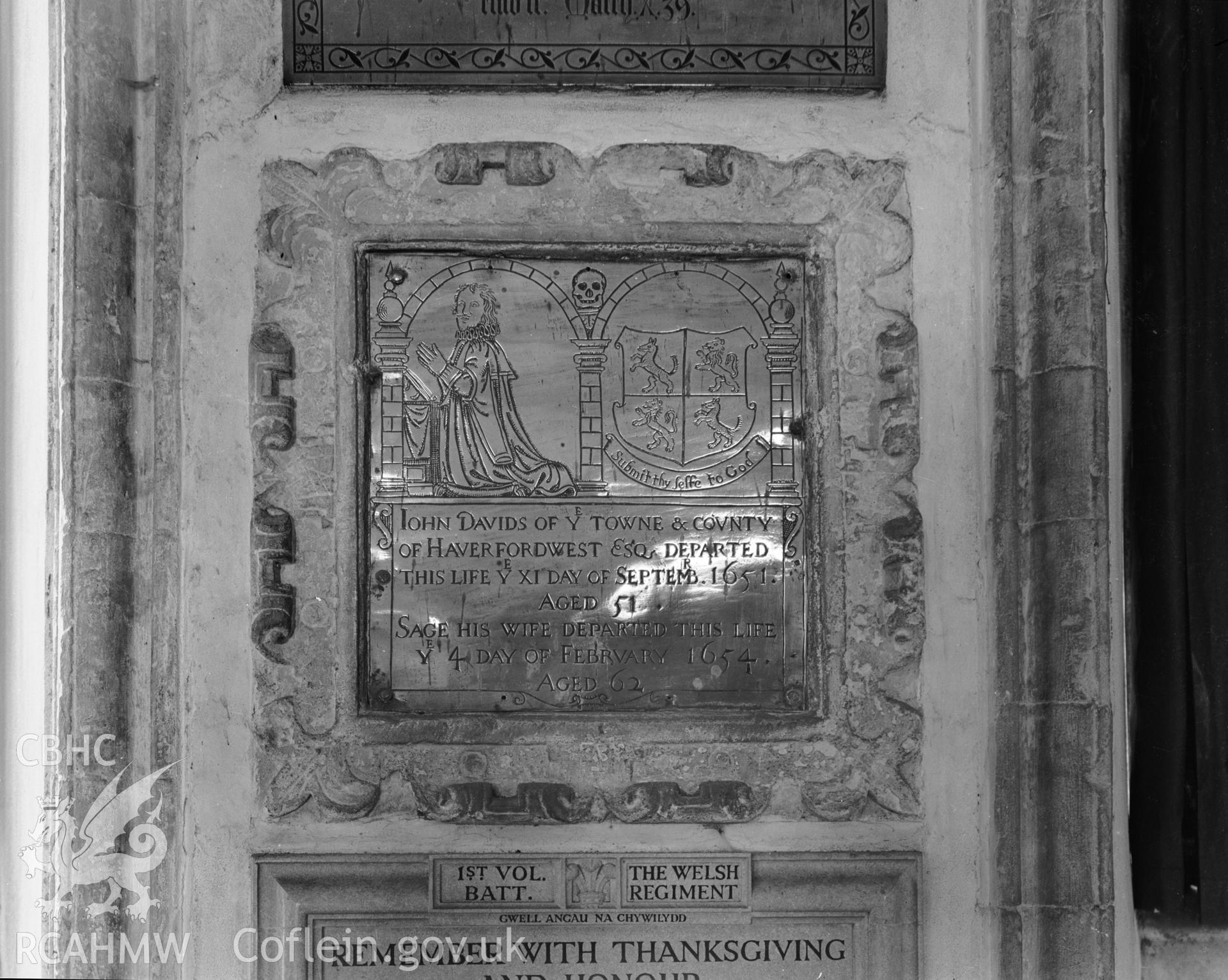 View of brass memorial on south wall of chancel
