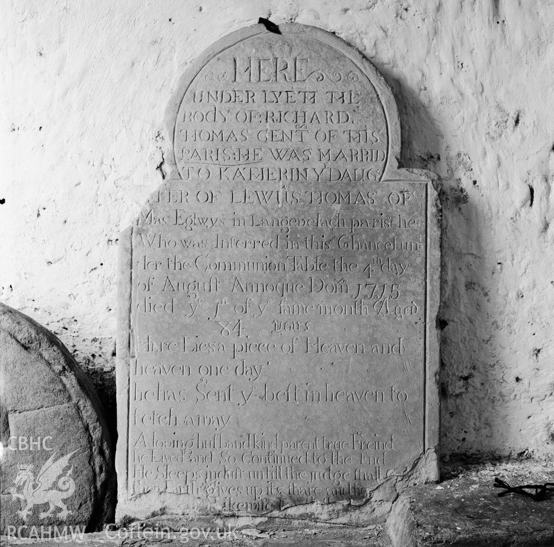 Memorial stone in the porch of St Ciwg's Church, taken by RCAHMW, circa 1974.