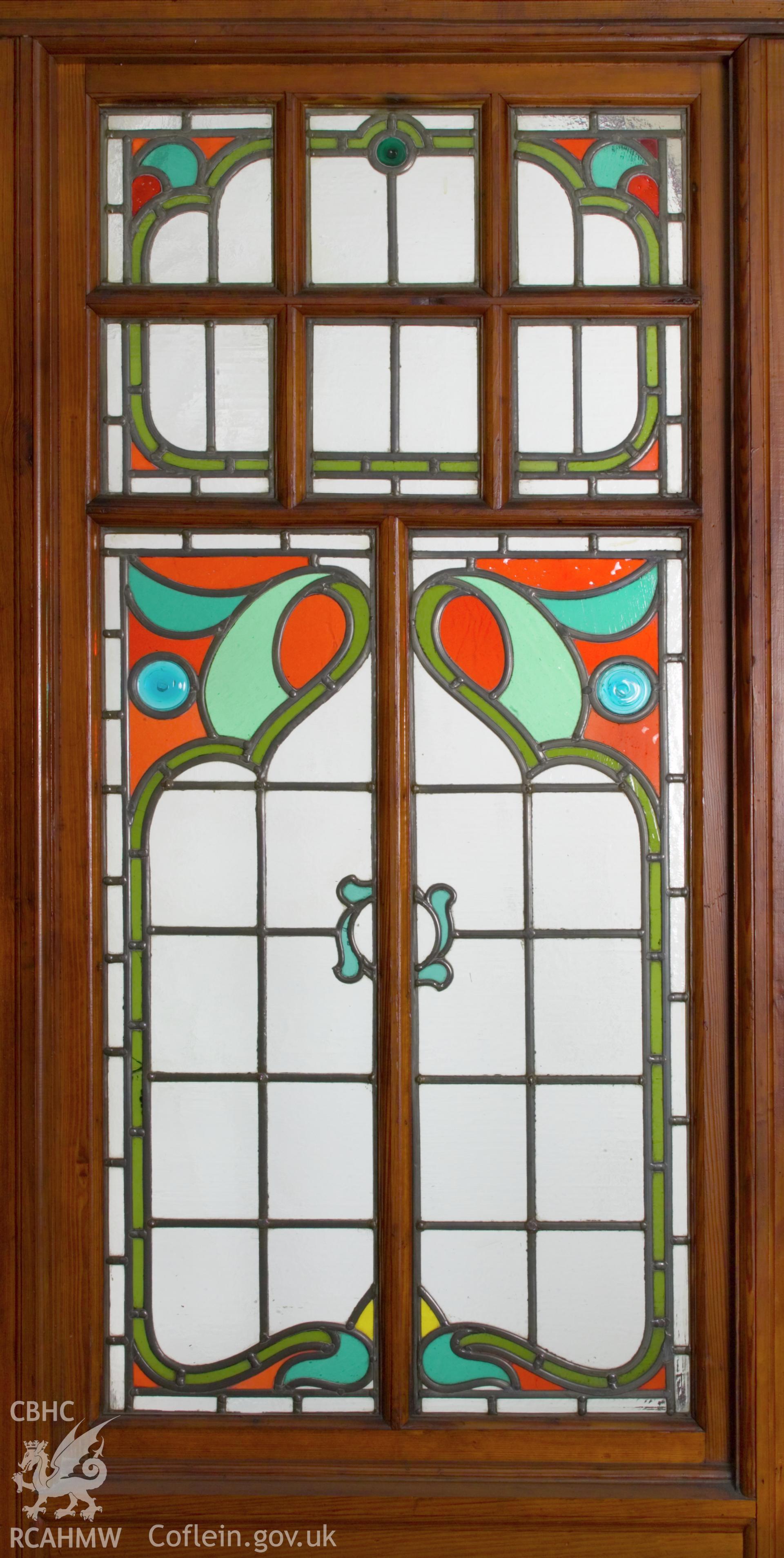Section of rear stained glass screen.