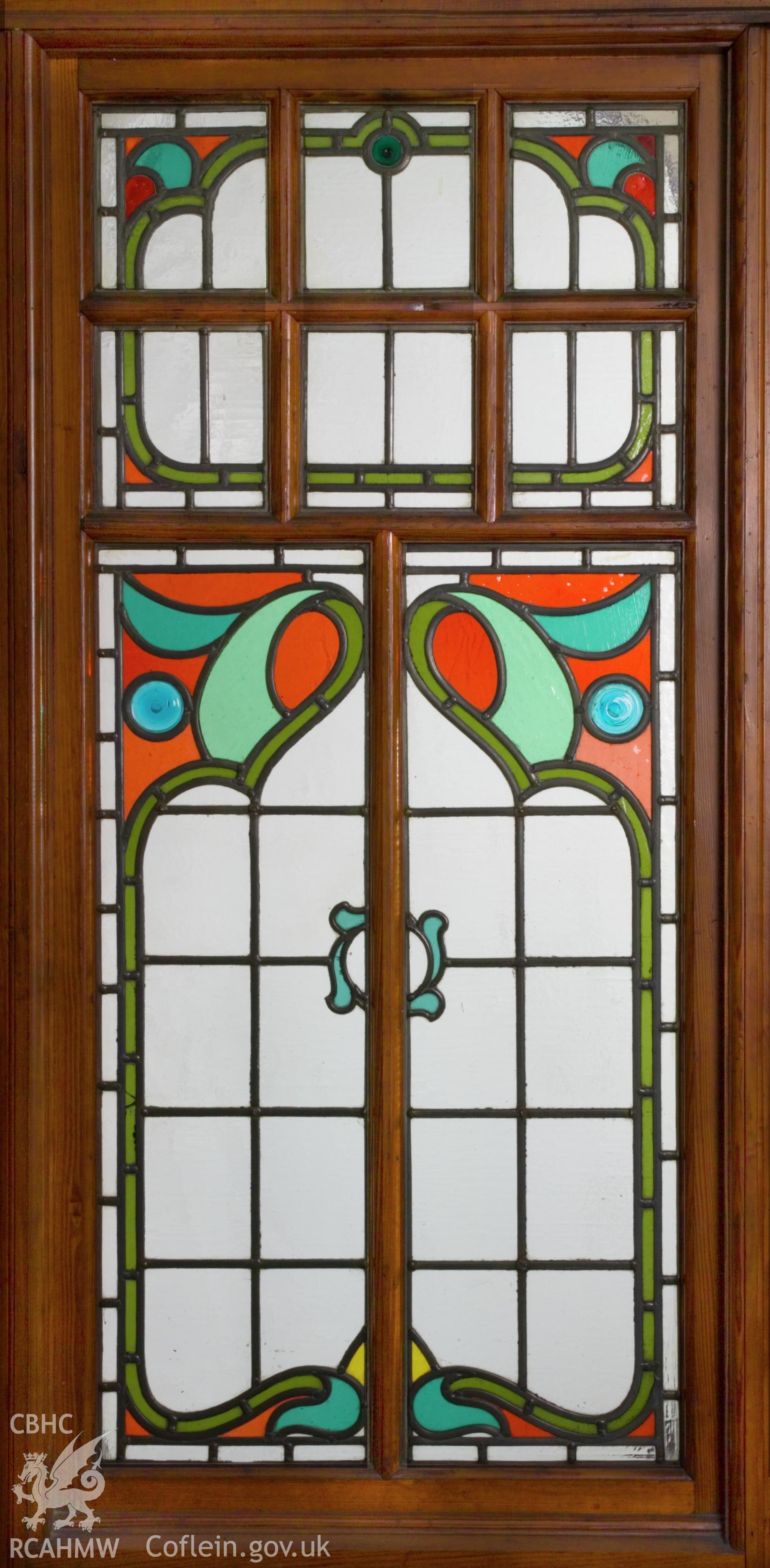 Section of rear stained glass screen.