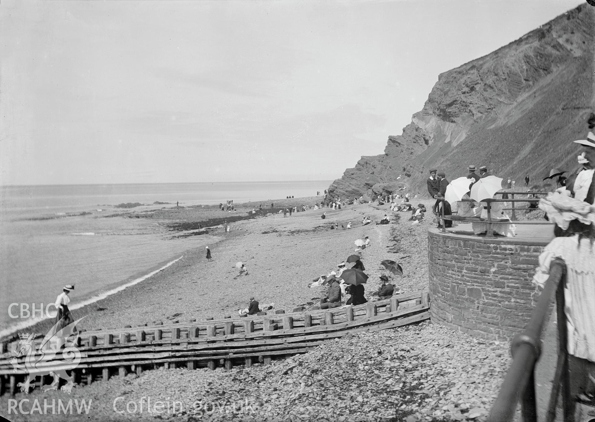 Black and white image dating from c.1910 showing the beach at the Constitution Hill end of the Promenade,  taken by Emile T. Evans.