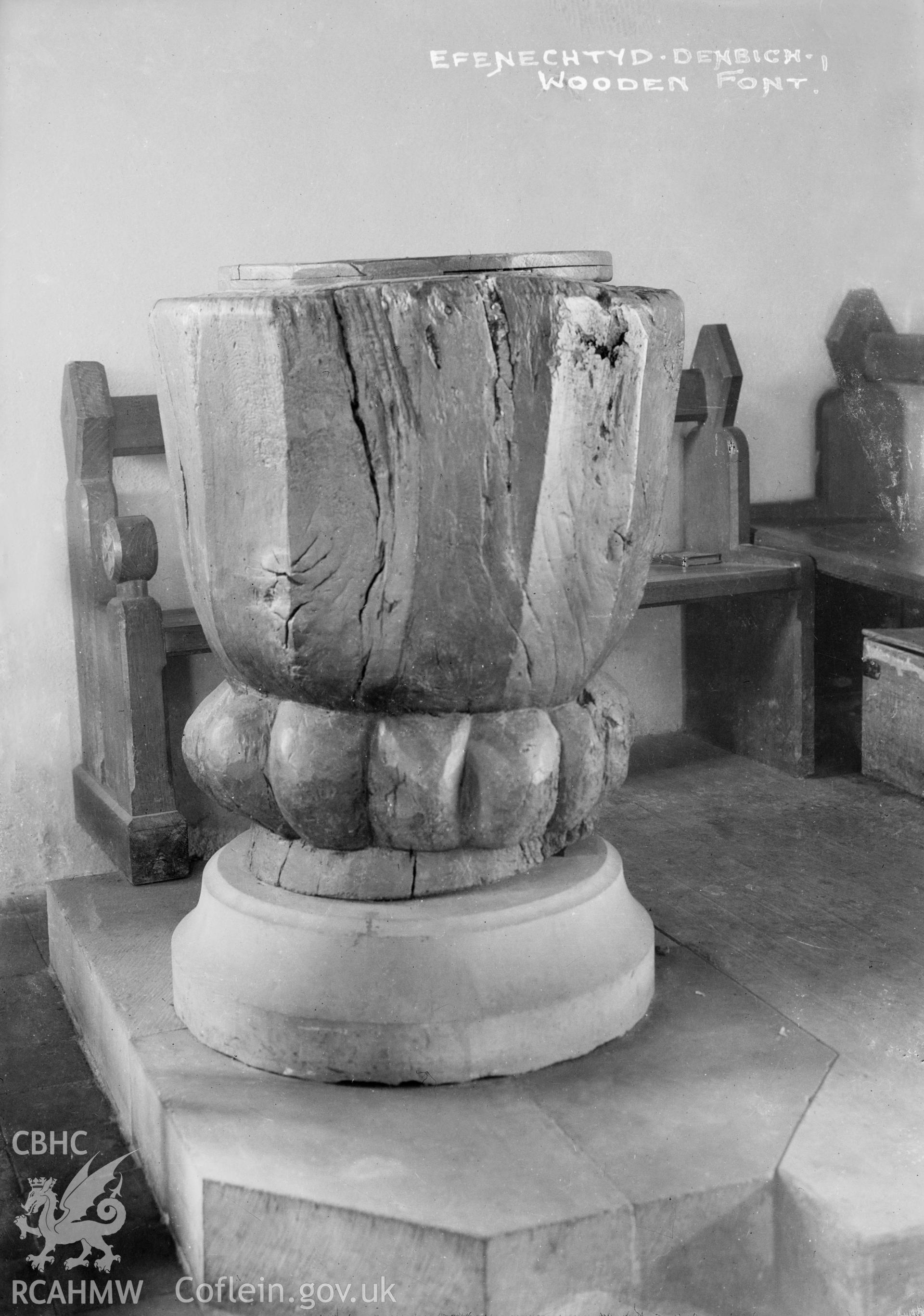 Black and white photograph of the font at St Michael's Church, Efenechtyd.