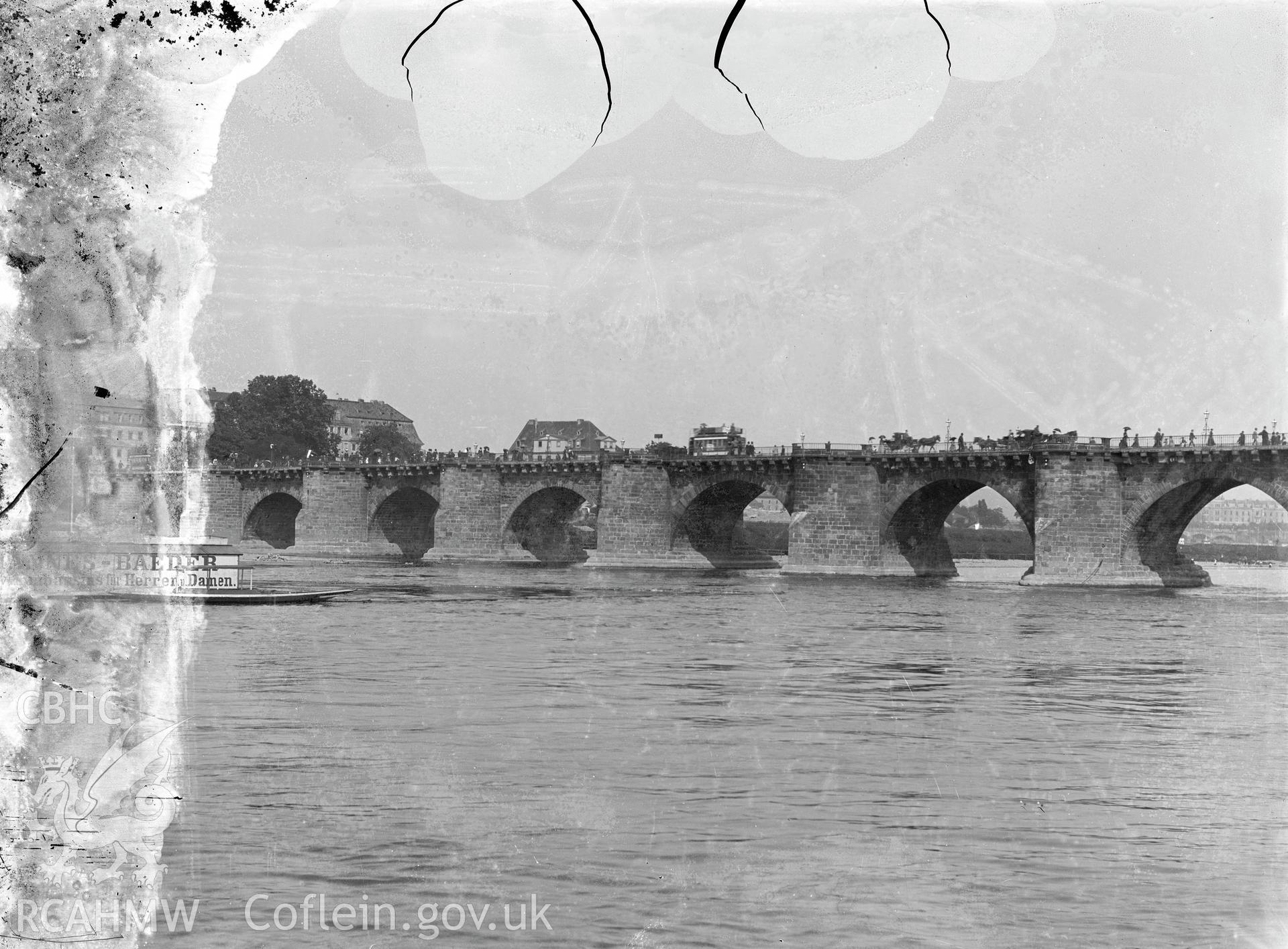 Black and white image dating from c.1910 showing an unidentified bridge in Europe, taken by Emile T. Evans.