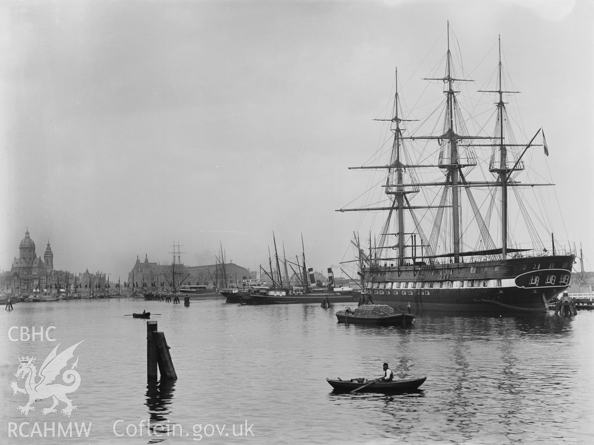 Black and white image dating from c.1910 showing a sailing ship in an unidentified port.
