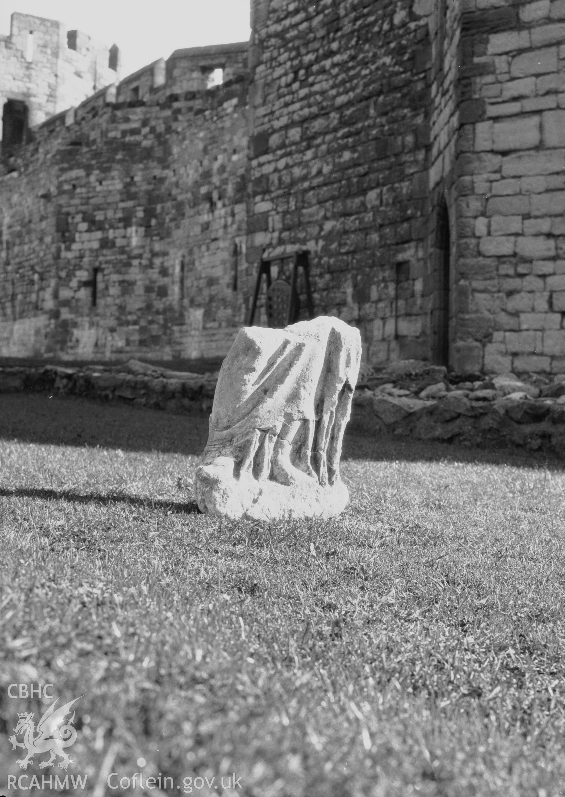 View of stone find on the lawn in front of Caernarfon Castle, Llanbeblig, taken 01.01.1956.