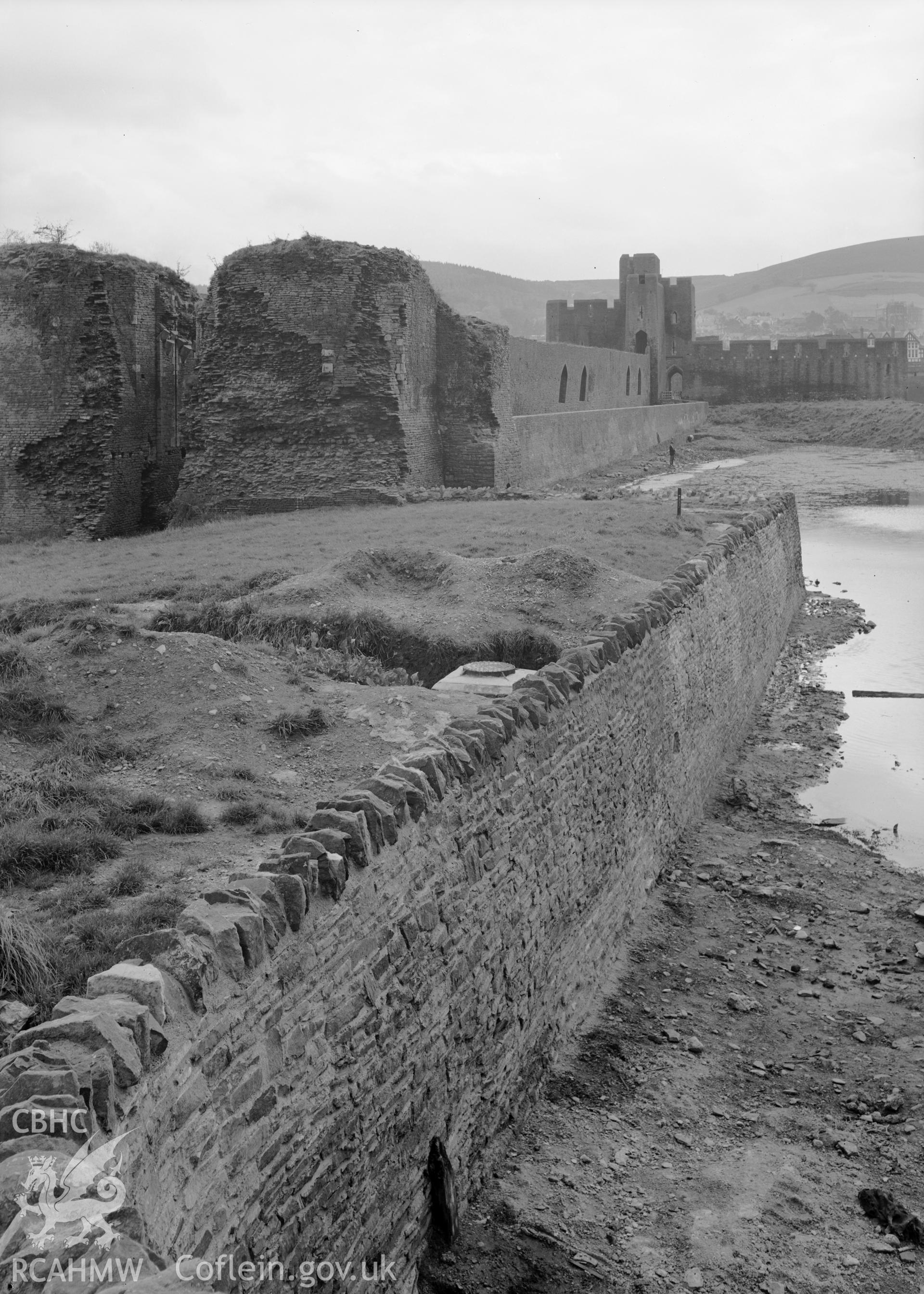 D.O.E photograph of Caerphilly Castle - north east corner of north lake, from north, showing north gate and platform.