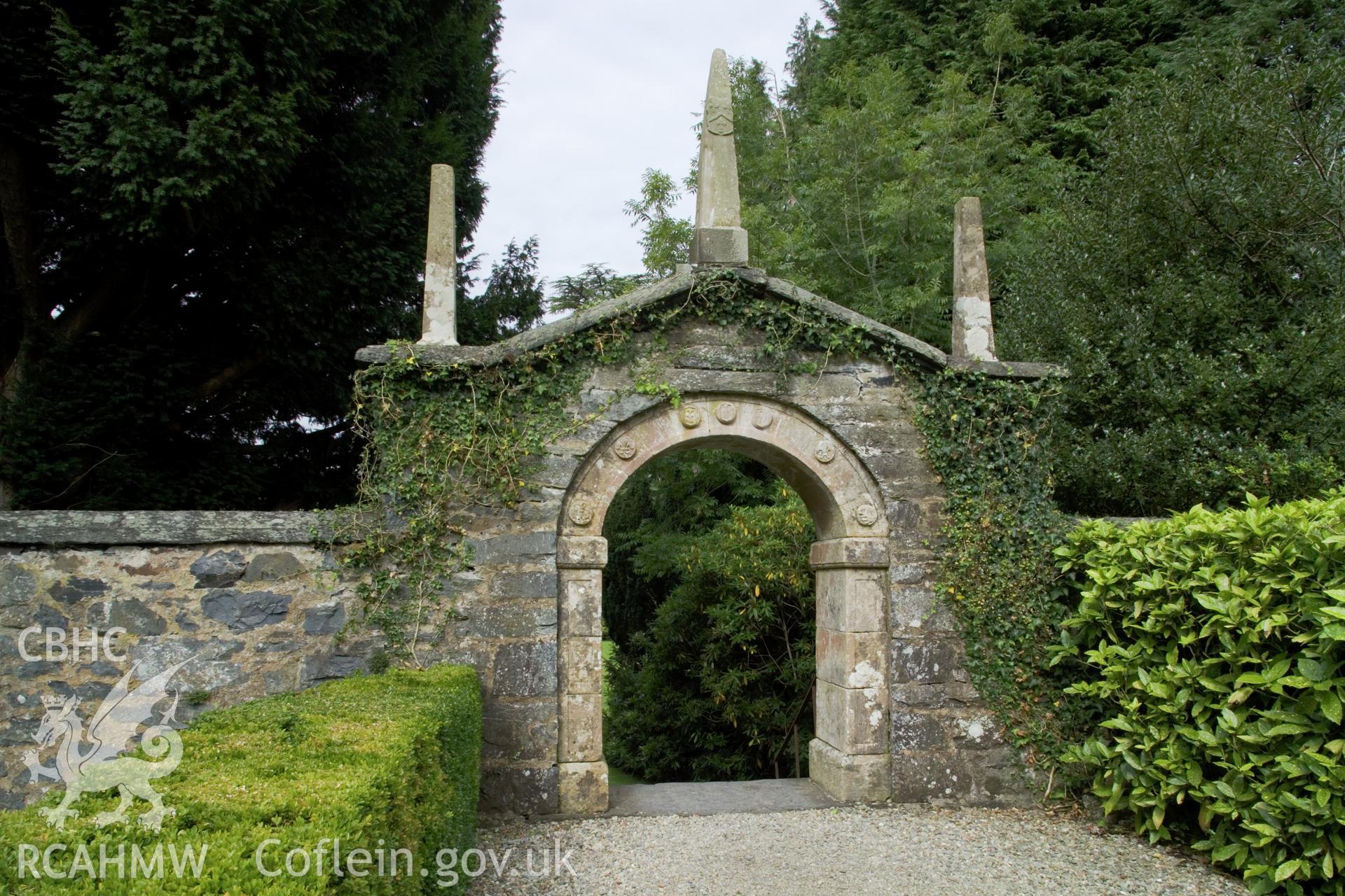 Elizabethan archway in garden.
