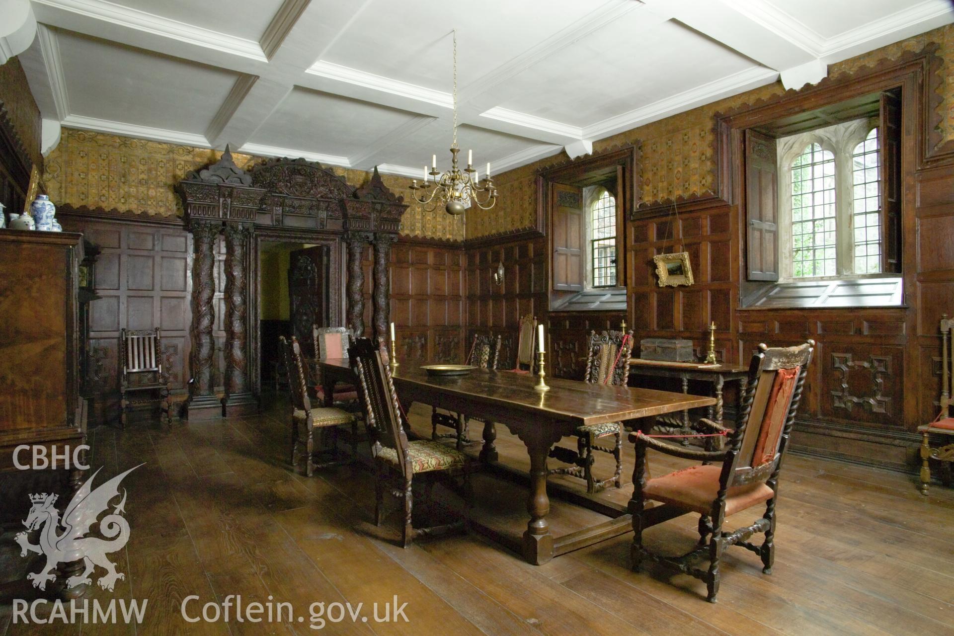 The panelled room.