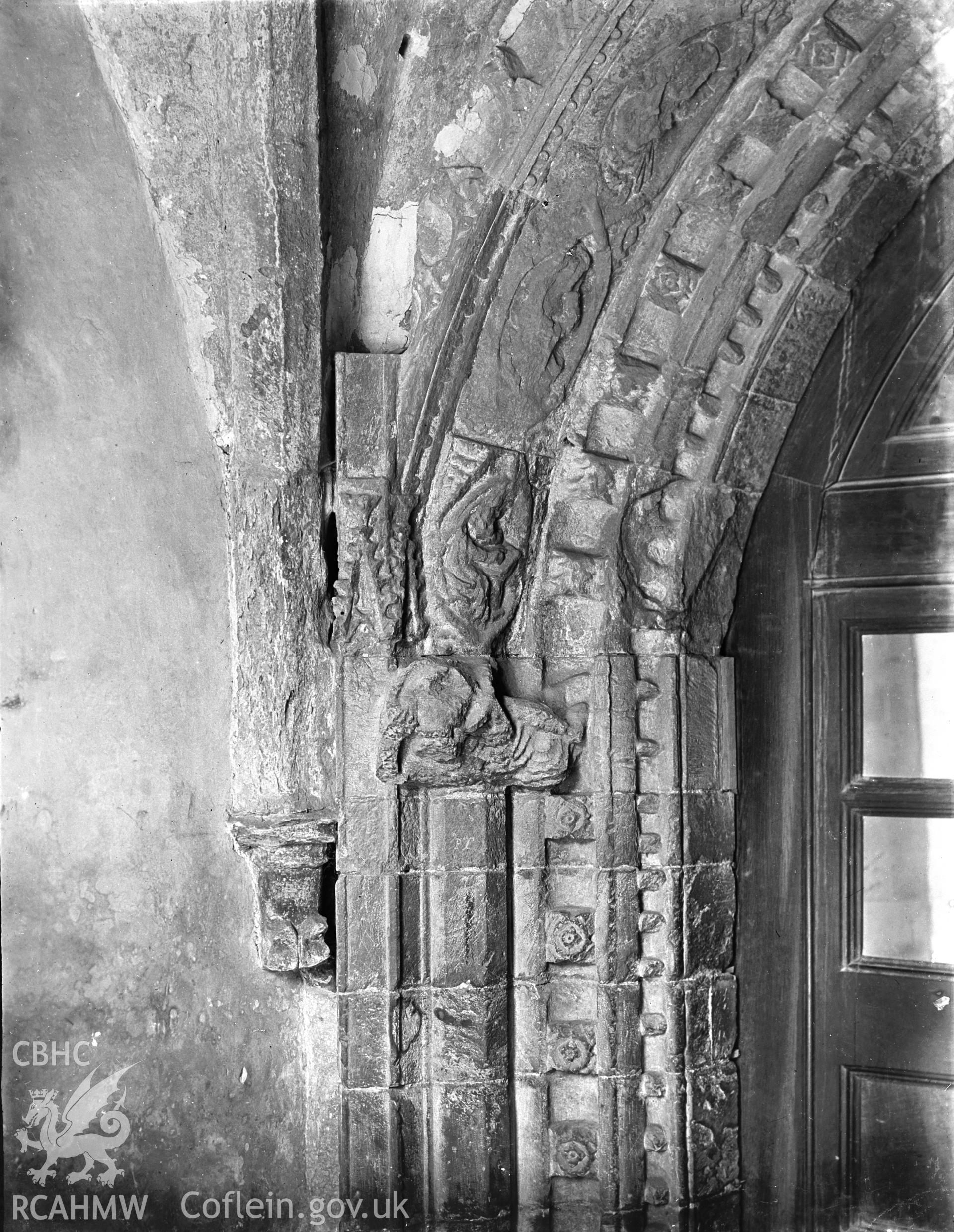 Detailed view of stone carving on the inner doors of the south porch at St David's Catherdral.