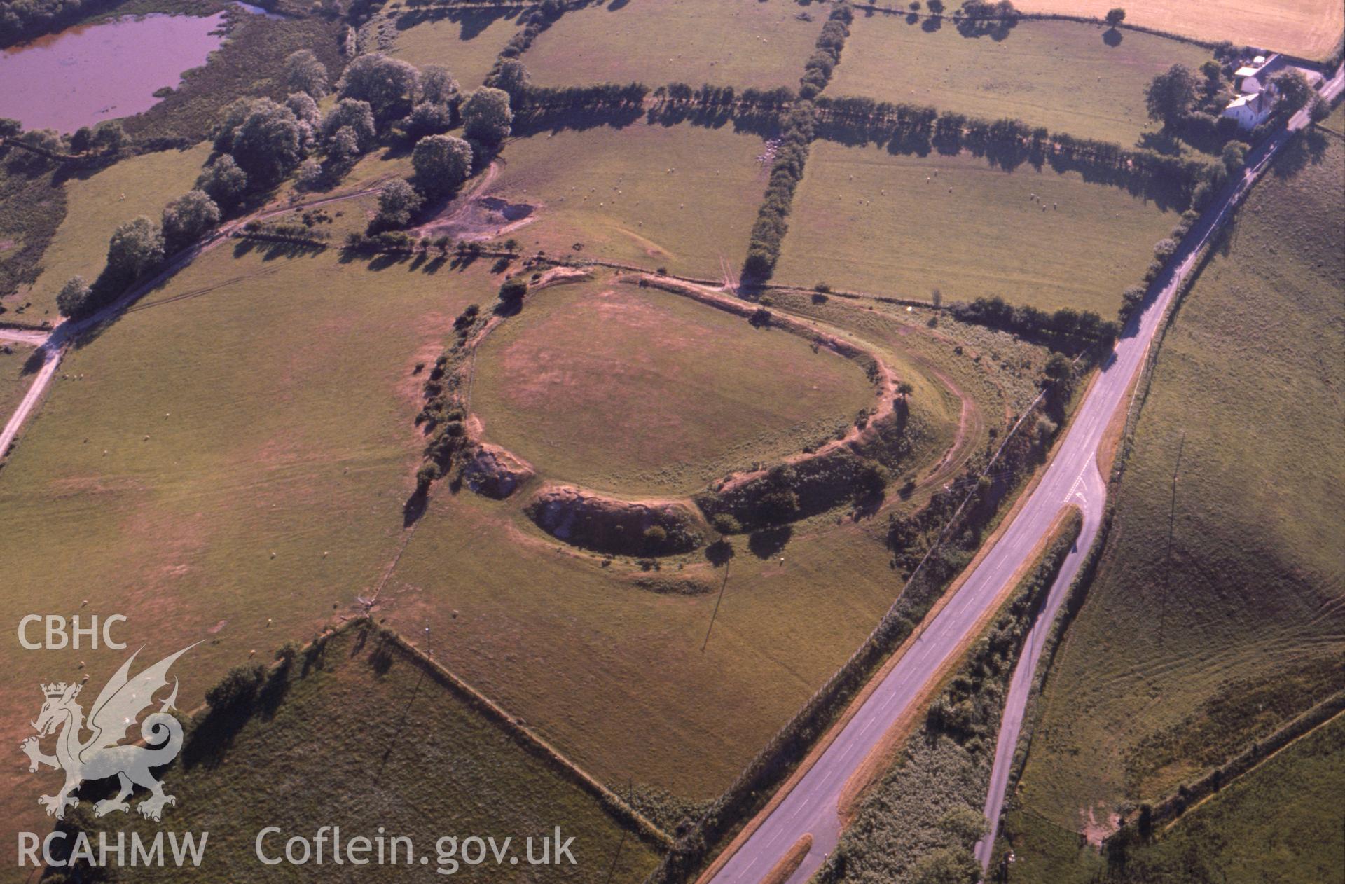 Slide of RCAHMW colour oblique aerial photograph of Castell Flemish, Hillfort, taken by C.R. Musson, 24/6/1989.