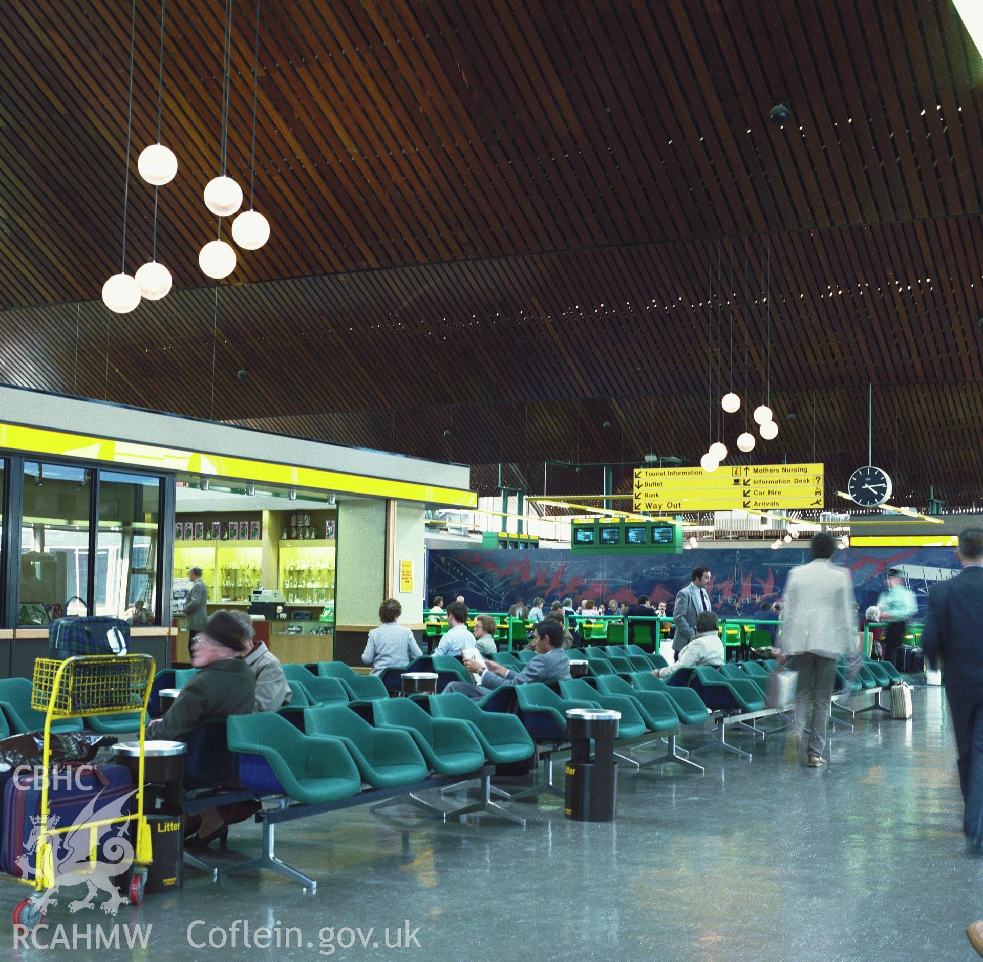 1 b/w contact print showing interior view of airport lounge at Cardiff Airport; collated by the former Central Office of Information.