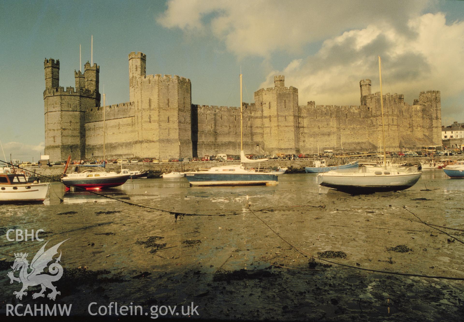 1 colour negative showing view of Caernarfon Castle with boats, collated by the former Central Office of Information.