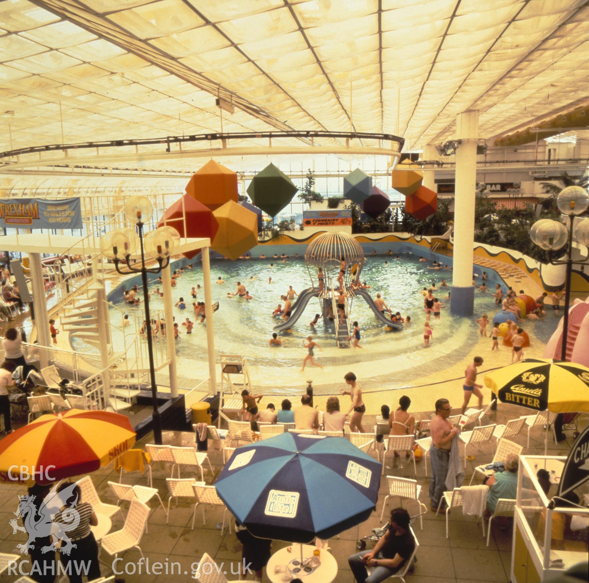 1 colour transparency showing interior view of swimming pool at Rhyl Sun Centre; collated by the former Central Office of Information.