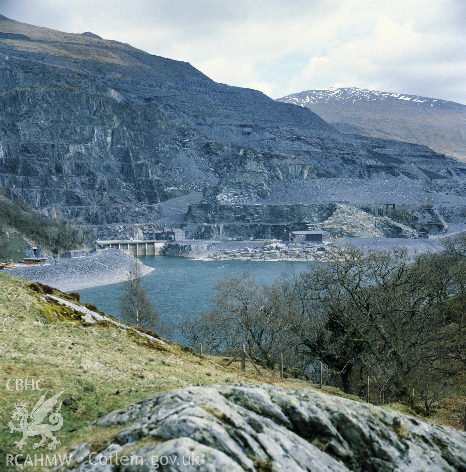 1 colour transparency showing view across Llyn Peris looking towards the main entrance at Dinorwig Power Station; collated by the former Central Office of Information.