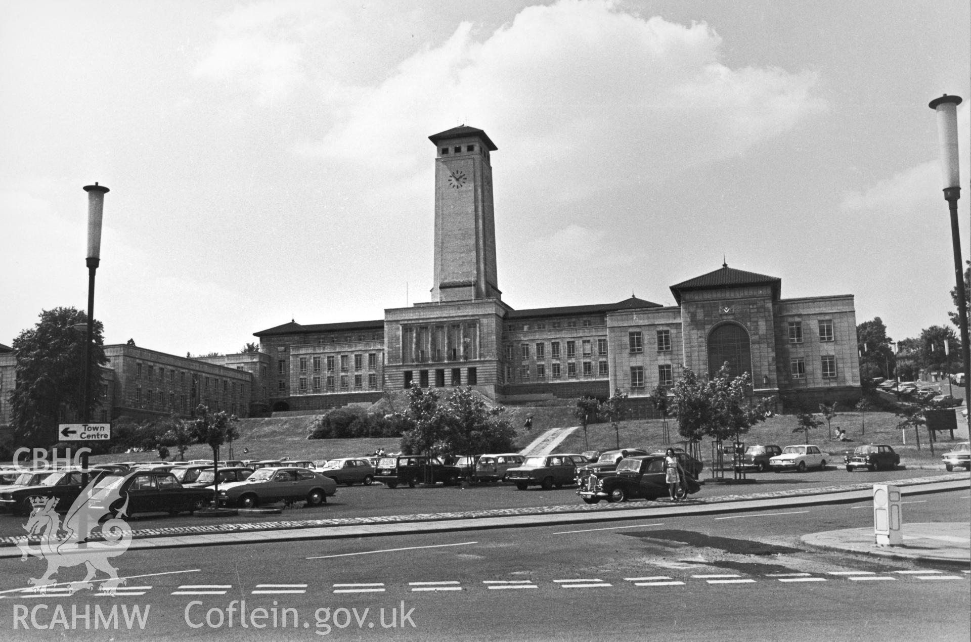 1 b/w print showing exterior view of Newport Civic Centre with car park in foreground; collated by the former Central Office of Information.