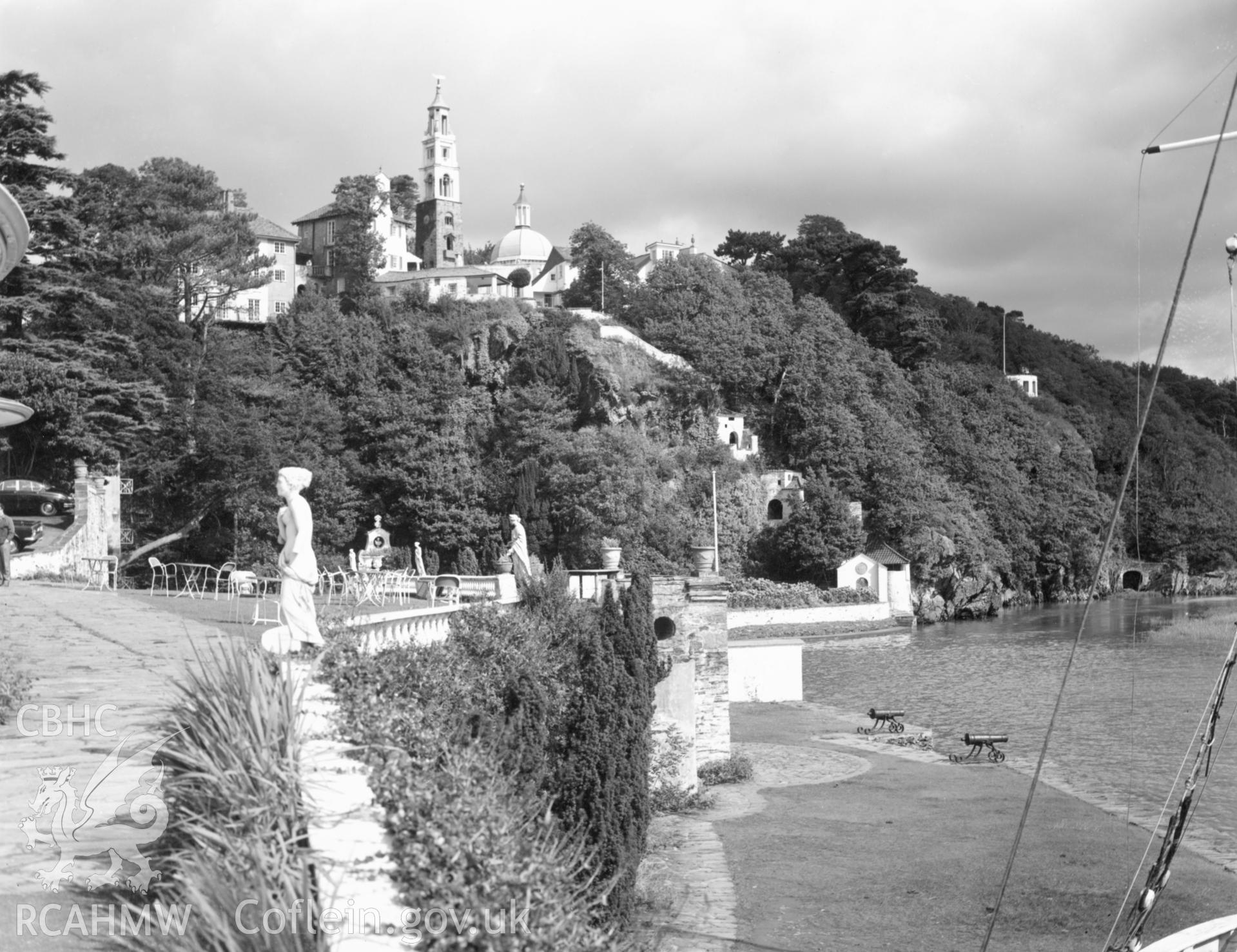1 b/w print showing view of the terrace and statues in the village of Portmeirion; collated by the former Central Office of Information.