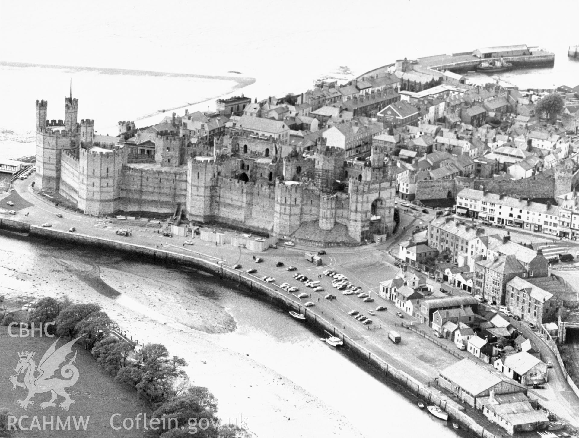 1 b/w print showing aerial view of Caernarfon castle and surrounding town, collated by the former Central Office of Information.