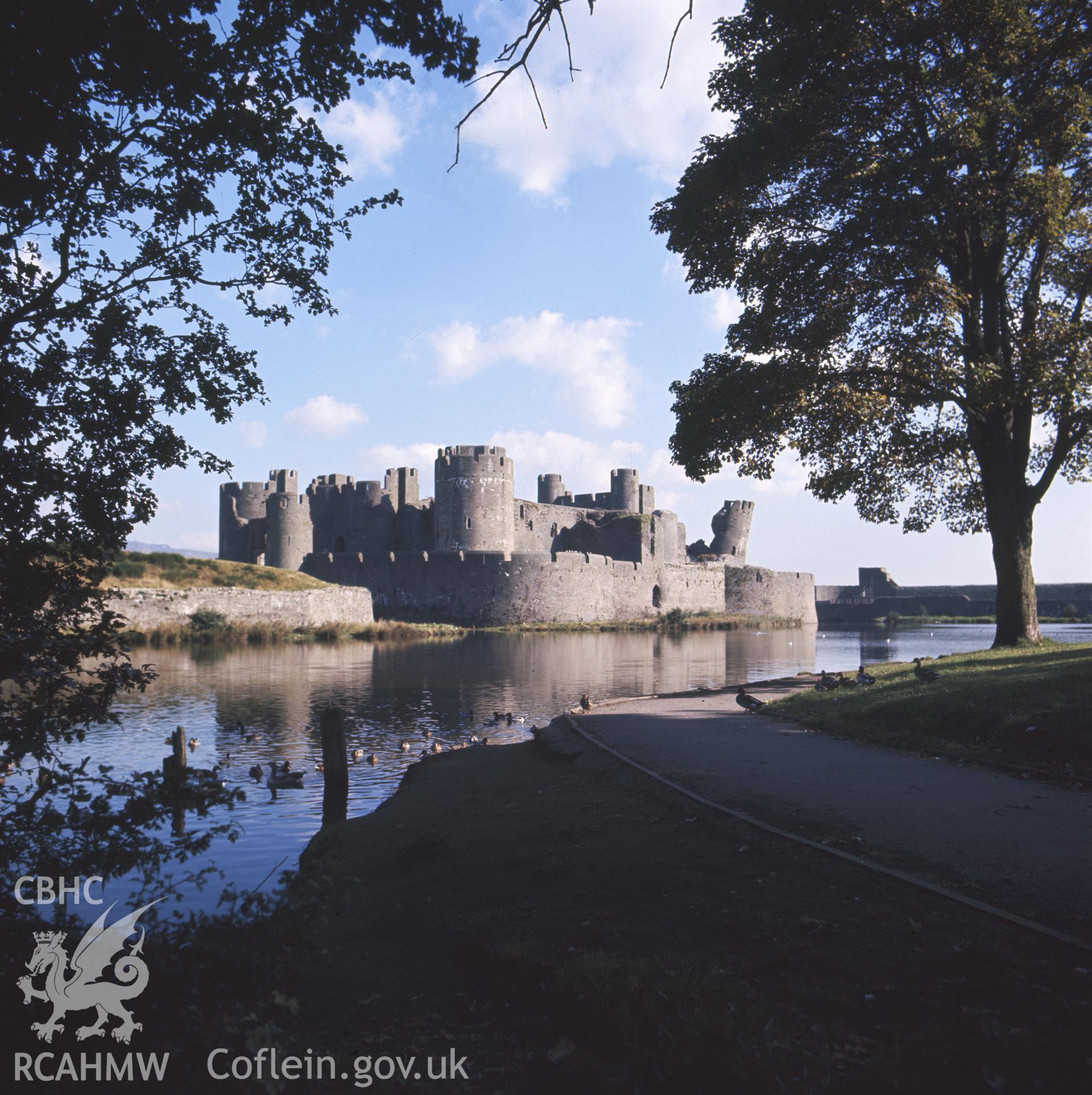 1 colour transparency showing view of Caerphilly Castle, undated; collated by the former Central Office of Information.