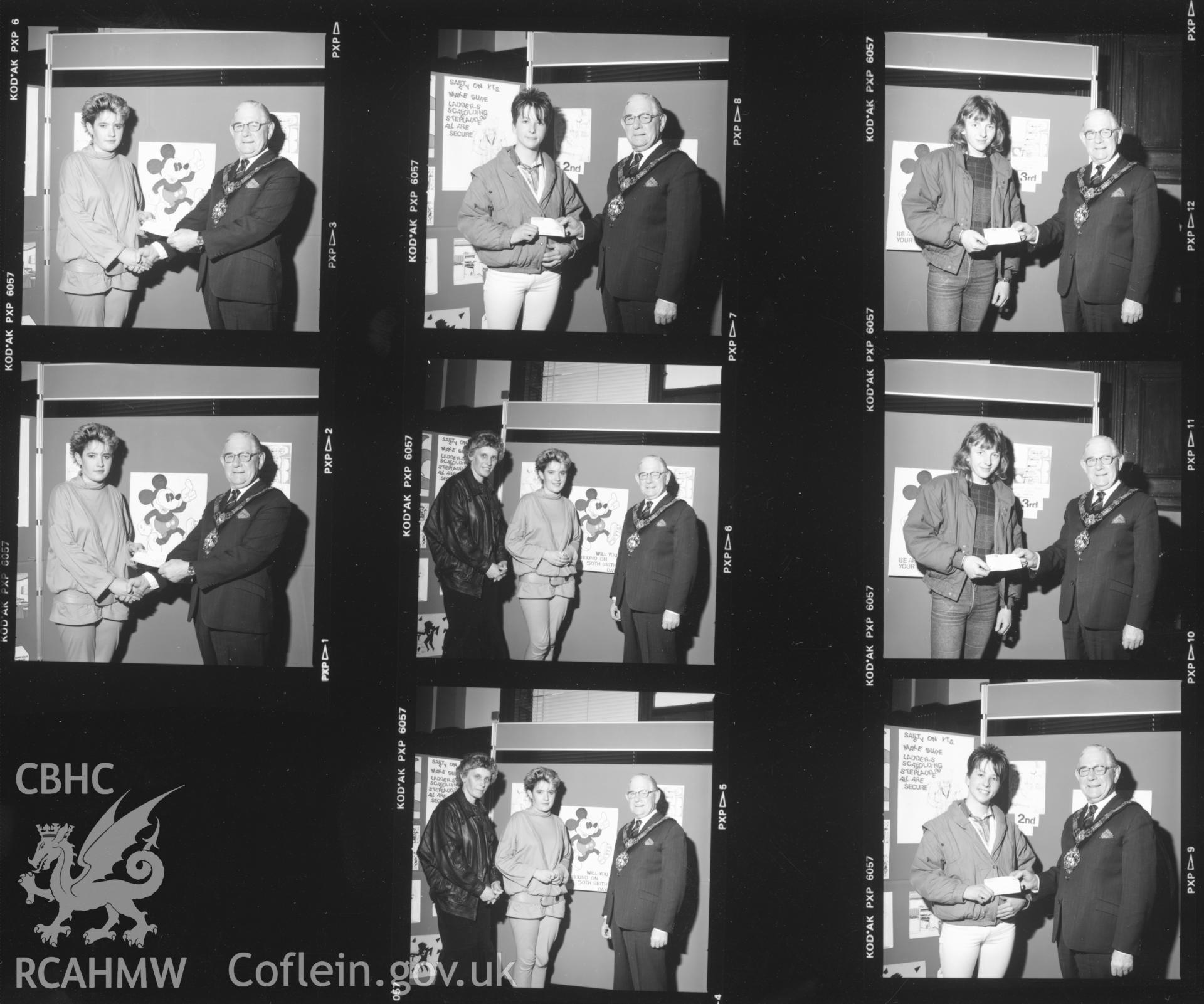 Contact sheet 2b of presentations for the poster competition at Llanelli Town Hall in 1986. From the Central Office of Information Collection.