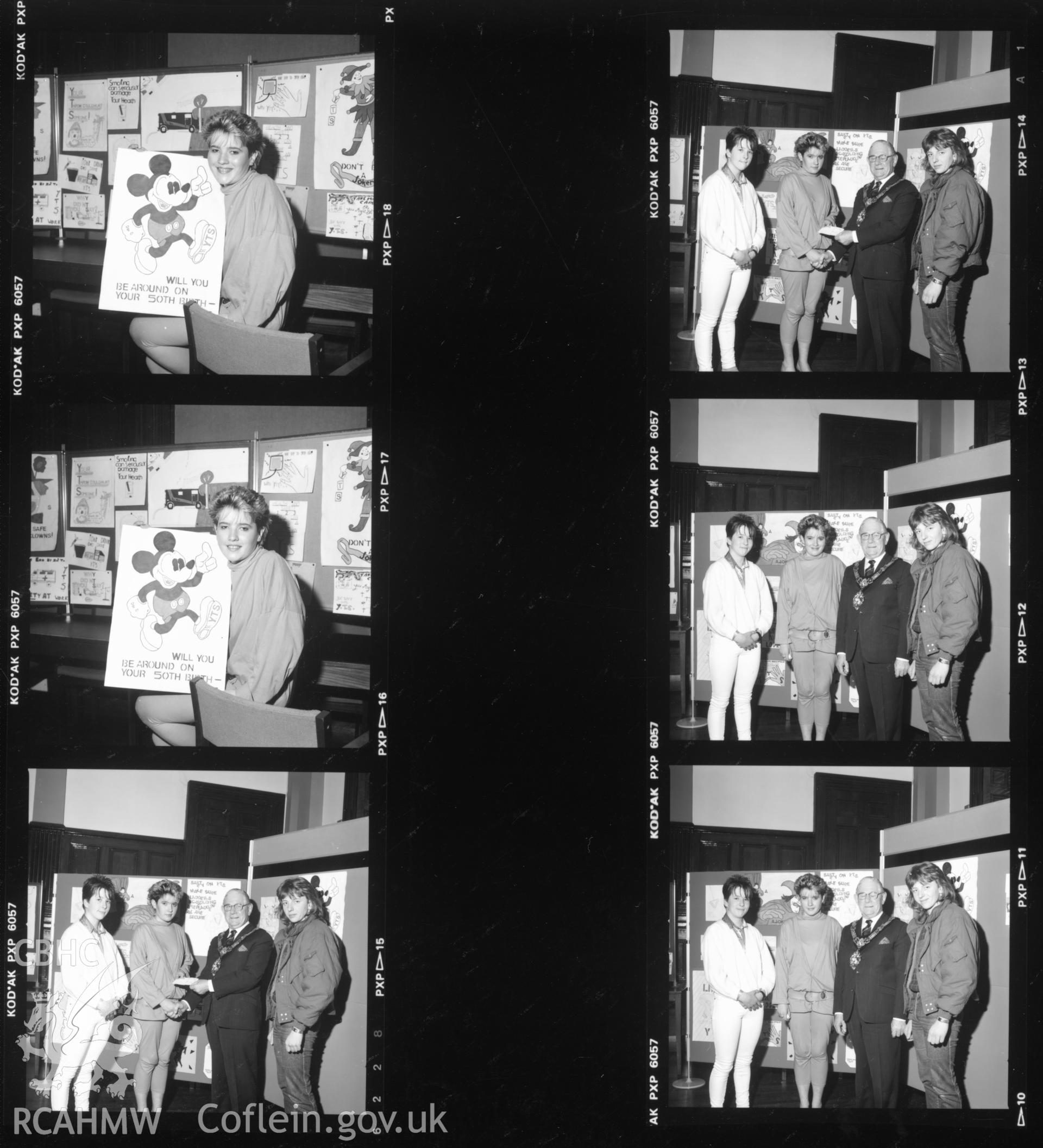 Contact sheet 1b of presentations for the poster competition at Llanelli Town Hall in 1986. From the Central Office of Information Collection.