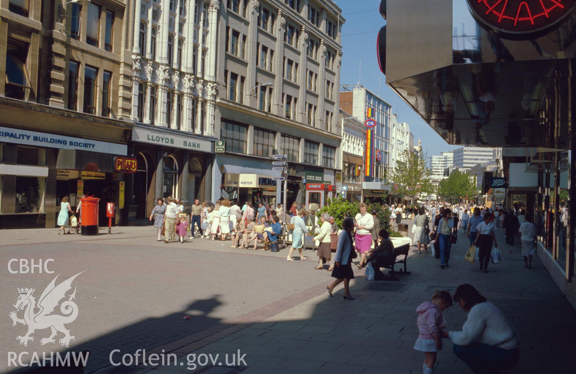 Colour transparency showing view of shopping streets, central Cardiff; collated by the former Central Office of Information.