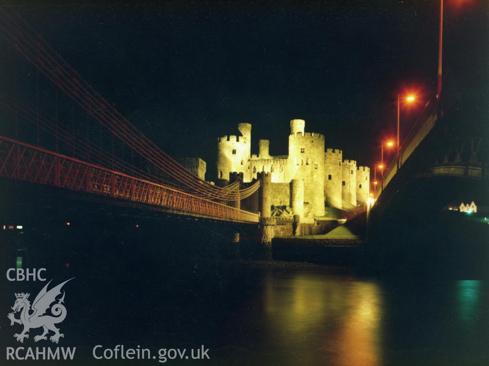 1 colour print showing night view of Conwy castle, collated by the former Central Office of Information.