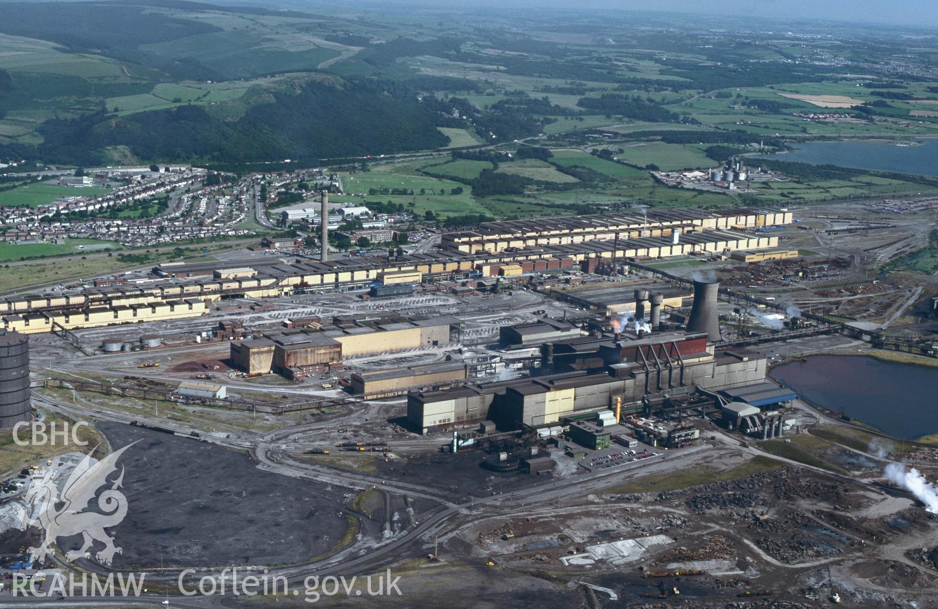 RCAHMW colour oblique aerial photograph of Margam steel works. Taken by C R Musson on 20/07/1995