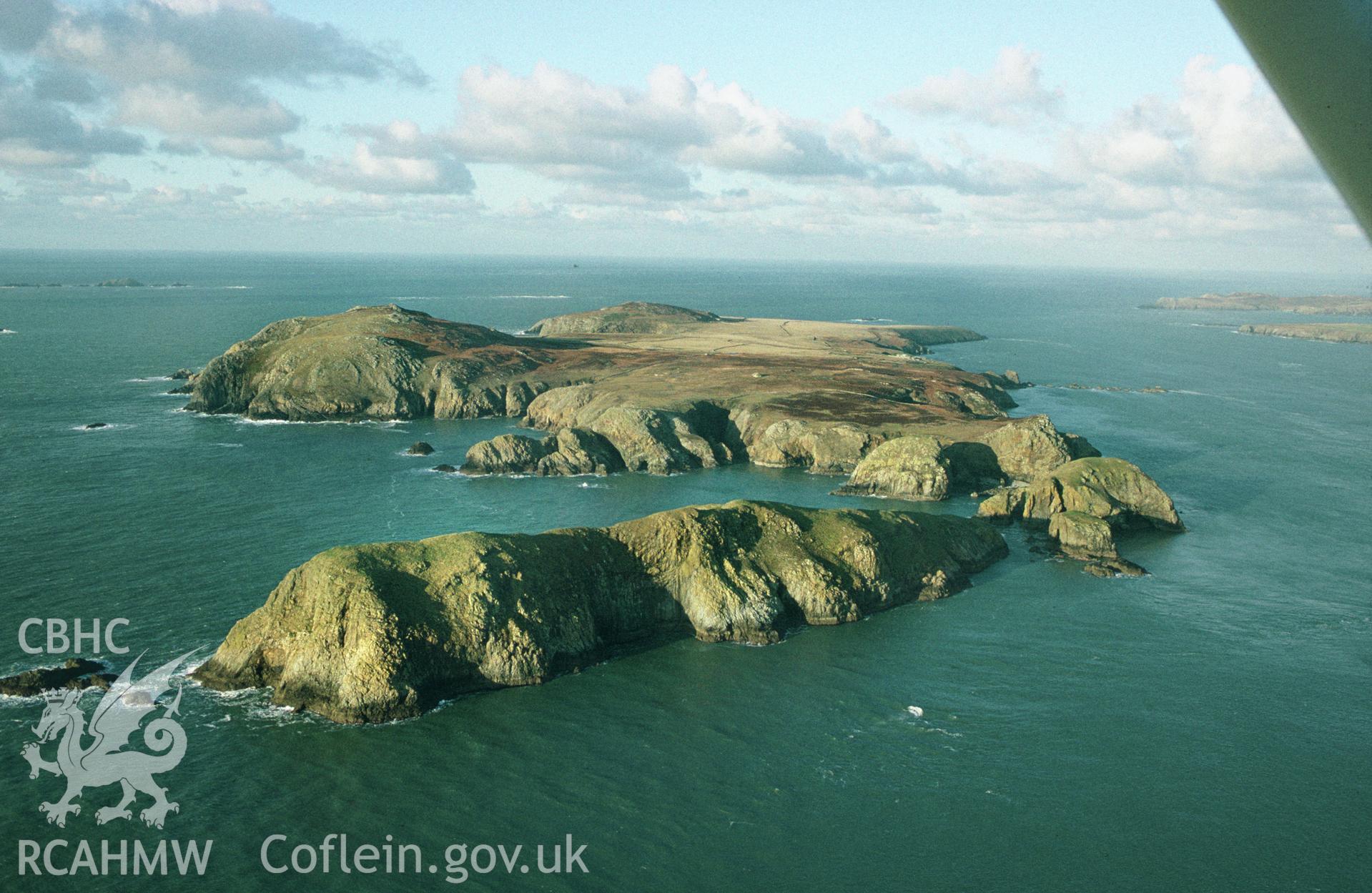 RCAHMW colour slide oblique aerial photograph of Ramsey Island, St Davids And The Cathedral Close, taken by C.R. Musson, 16/01/94